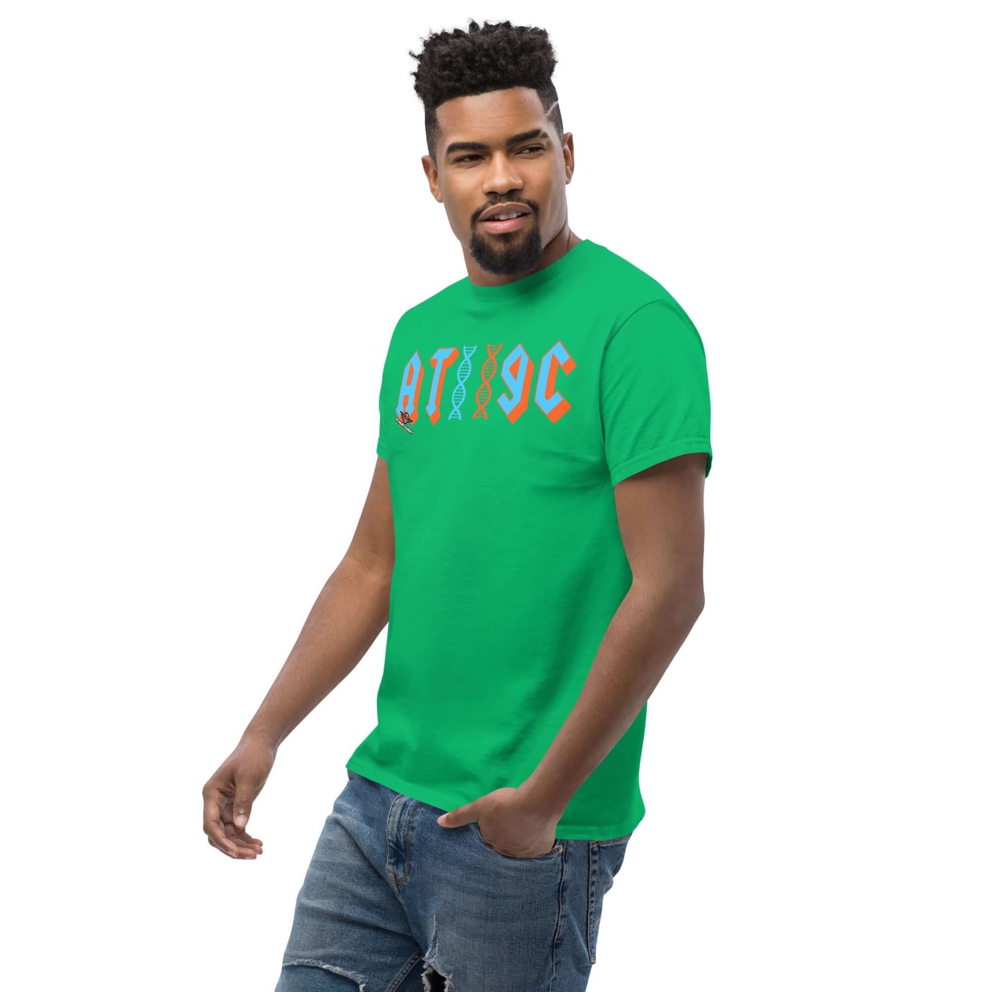 Man wearing AT/GC Rock Band DNA T-Shirt in green, featuring a genetics-inspired heavy metal logo with DNA double helix design.