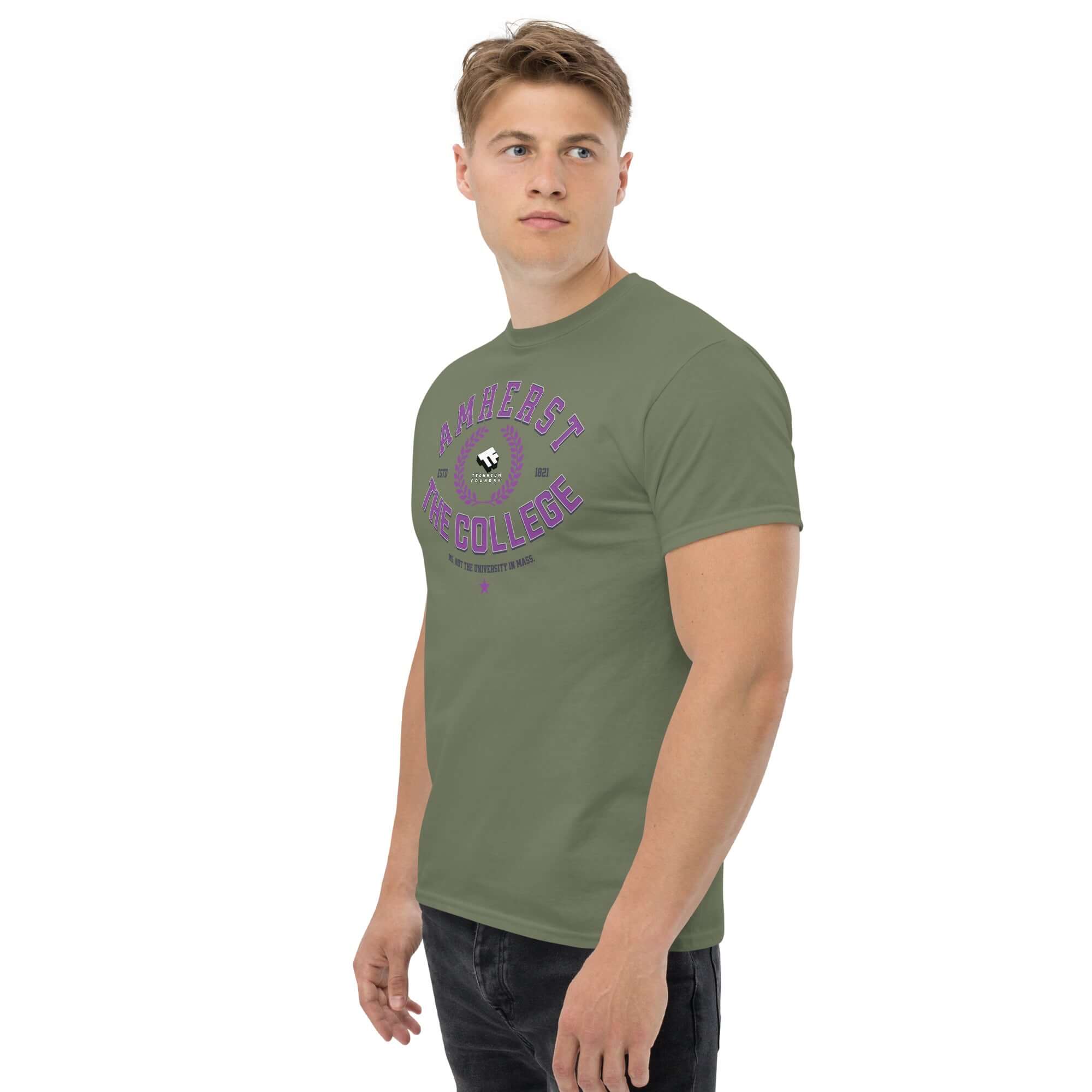 Man wearing Amherst elite college identity crisis t-shirt with green background, showcasing passive-aggressive typography.
