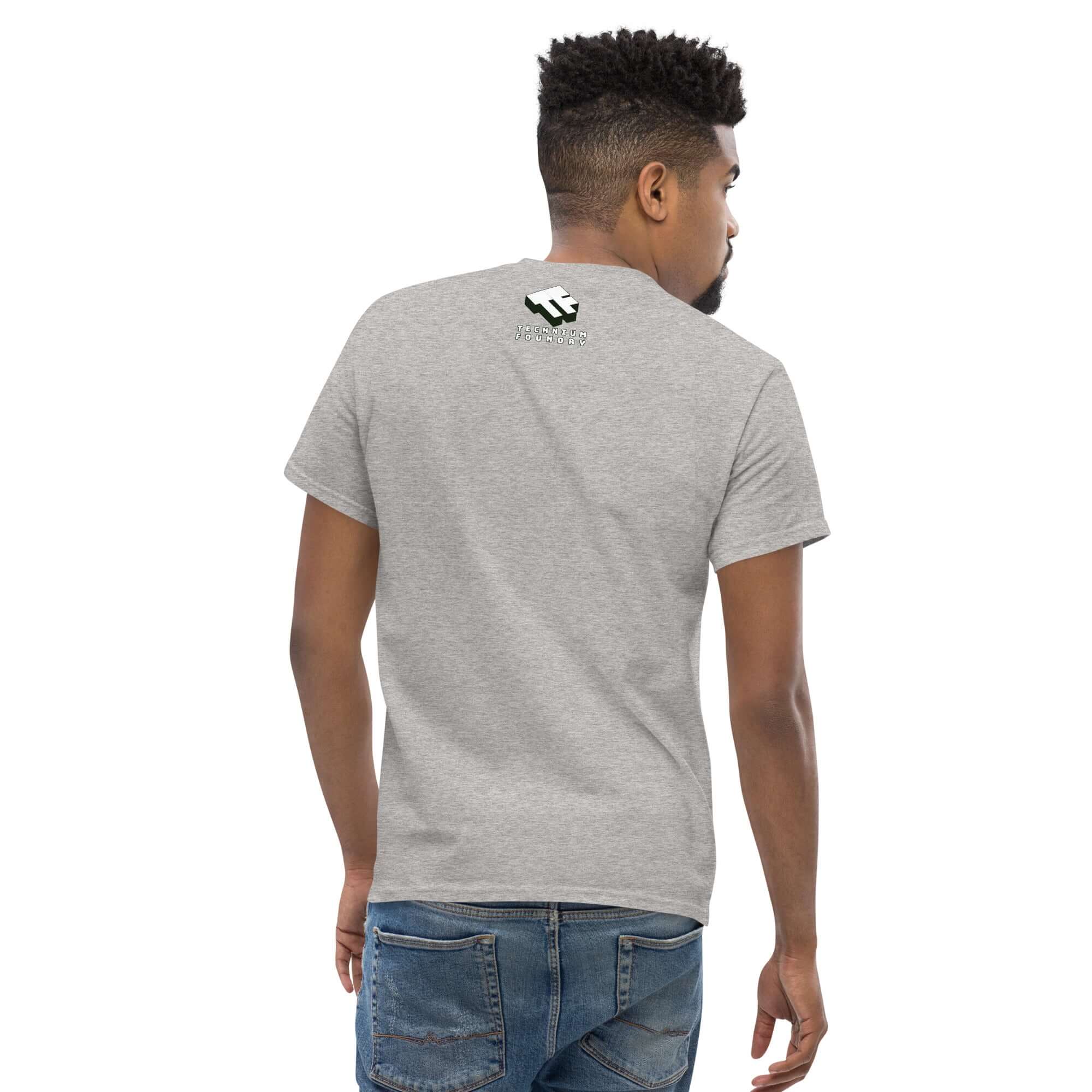 Back view of a man wearing a plain gray t-shirt, showcasing the fit and style. Perfect for casual wear or pairing with jeans.