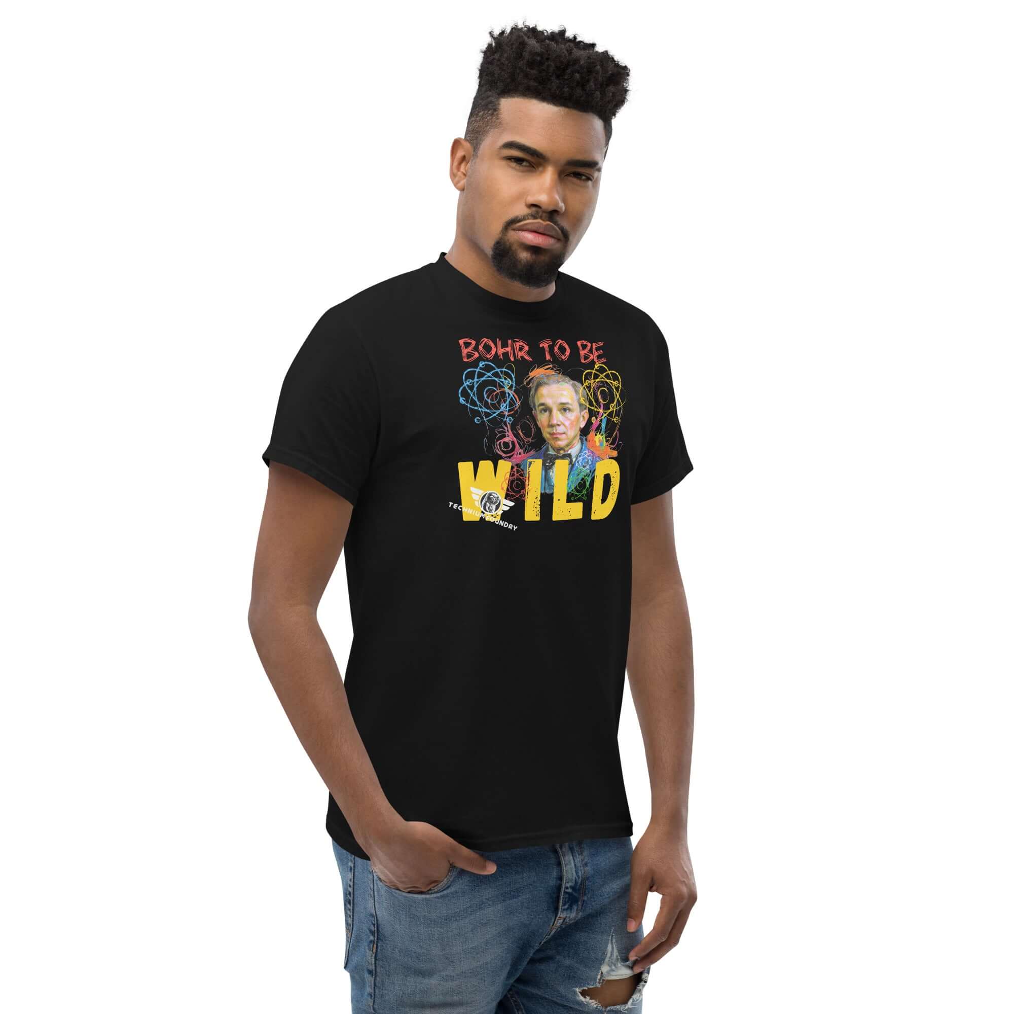 Man wearing Bohr to Be Wild t-shirt with Niels Bohr portrait and atomic design, celebrating quantum physics and rock & roll fusion art.