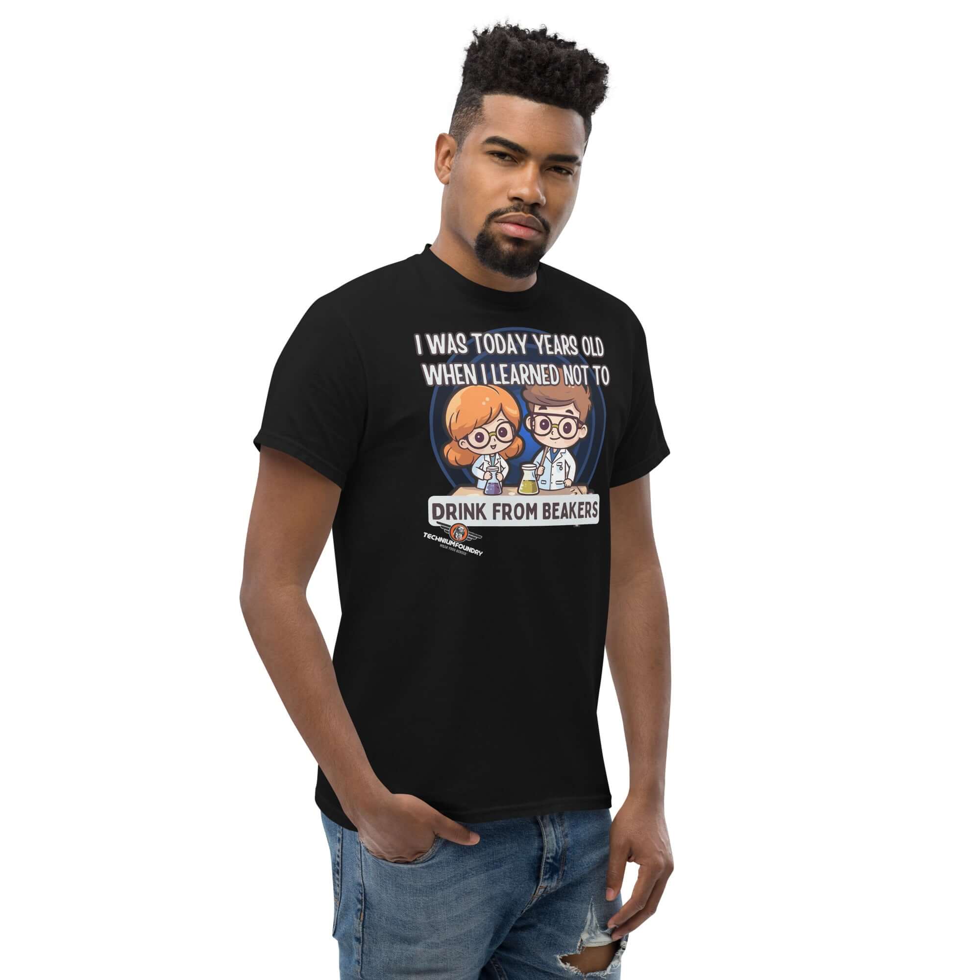 Man wearing 'Don't Drink from Beakers' lab safety t-shirt with chibi scientists and chemistry humor.