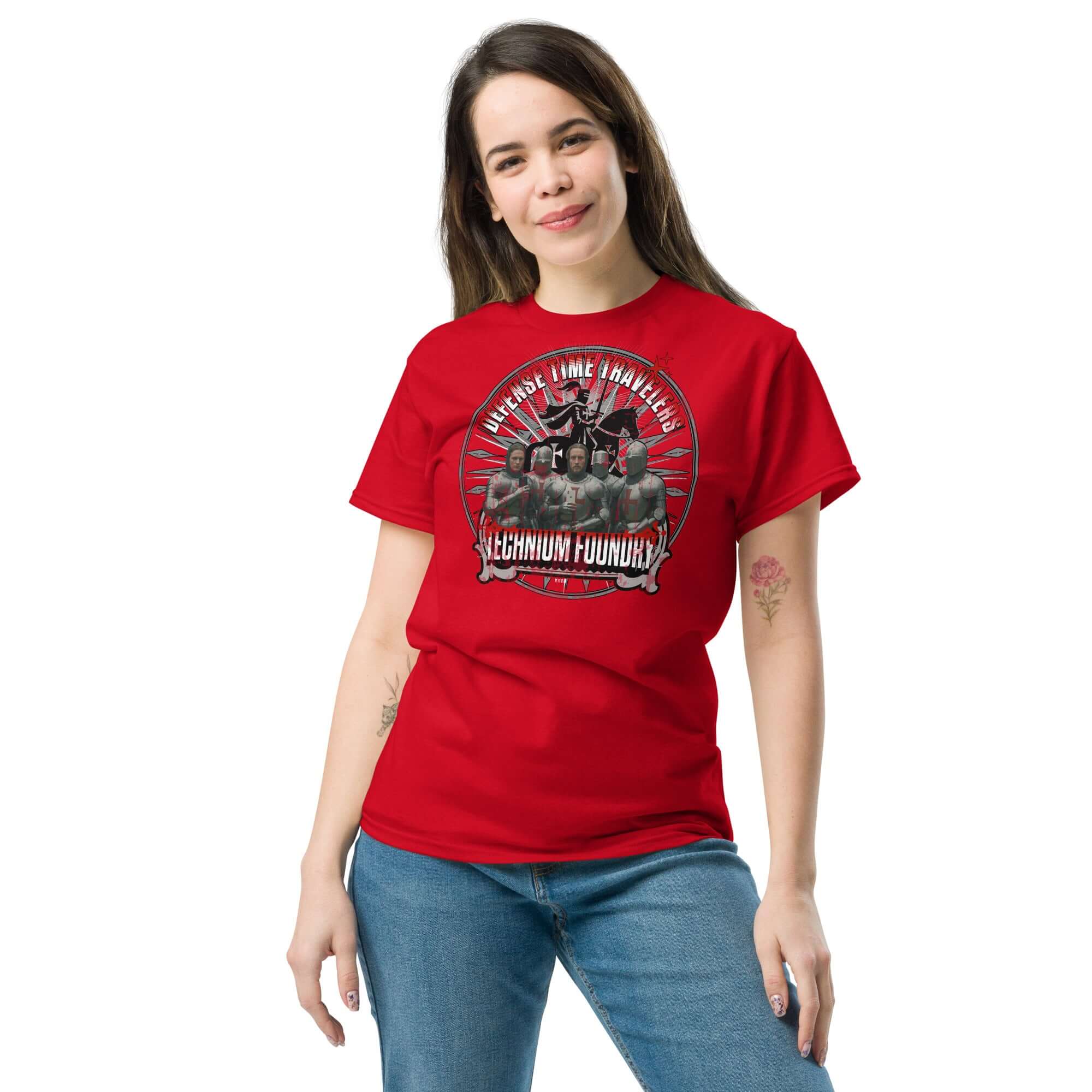 Red T-shirt with Defense Time Traveling Knights print modeled by a woman, featuring medieval knights and a playful tech paradox theme.