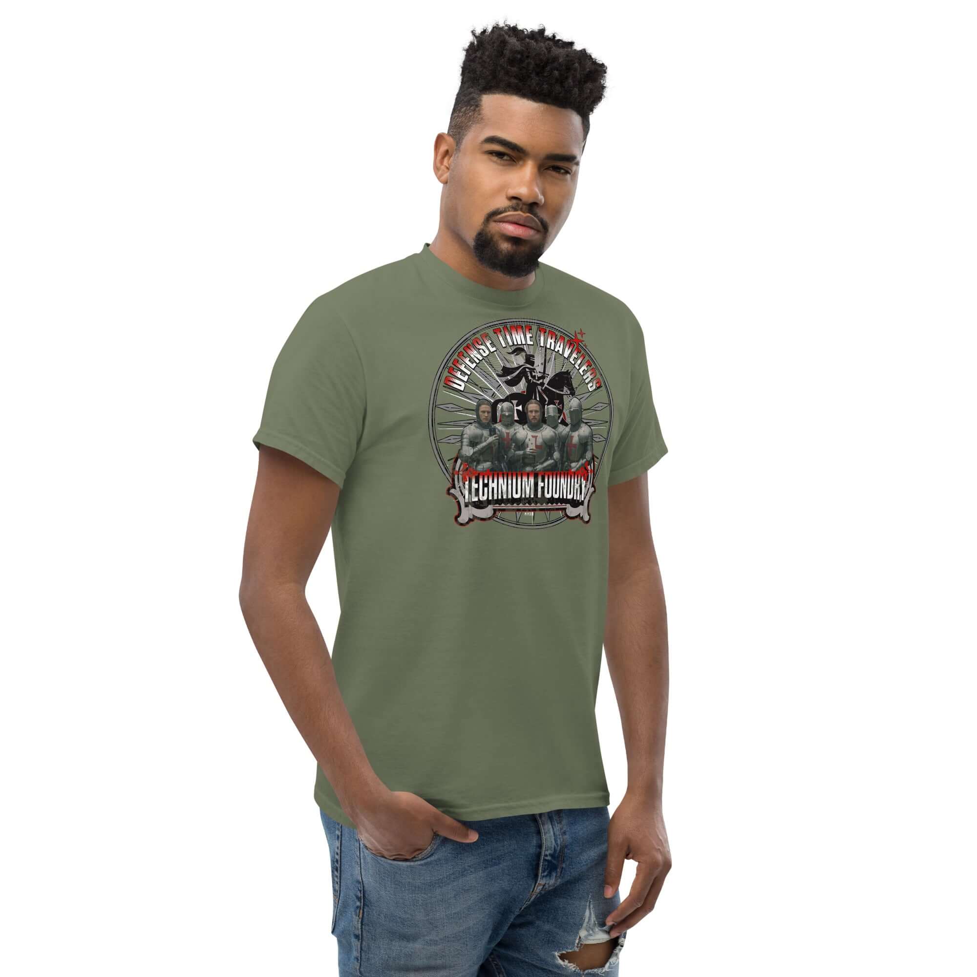 Man in green "Defense Time Traveling Knights" T-shirt featuring medieval tech paradox design, embodying creativity and adventure.