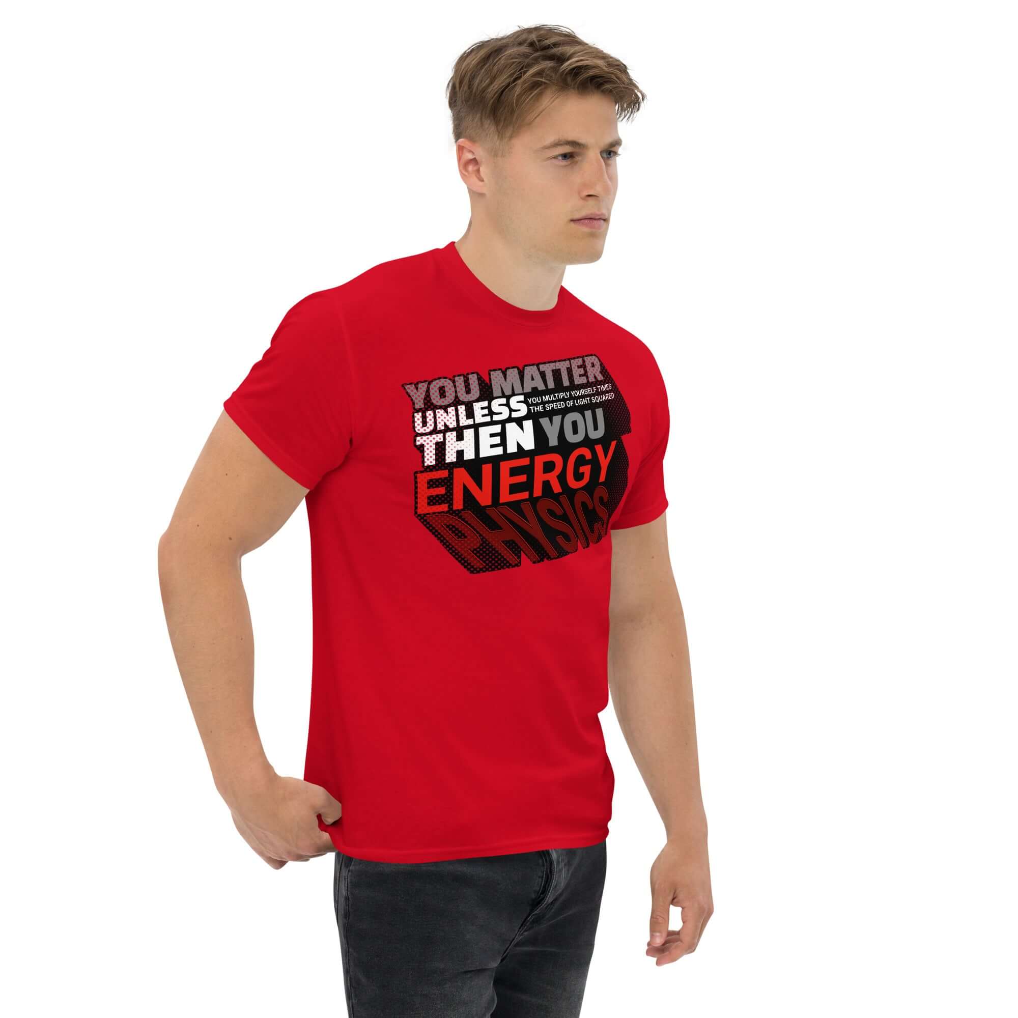 Red t-shirt with Einstein's E=mc² humorous word equation design in gradient yellow-to-orange text, worn by model.