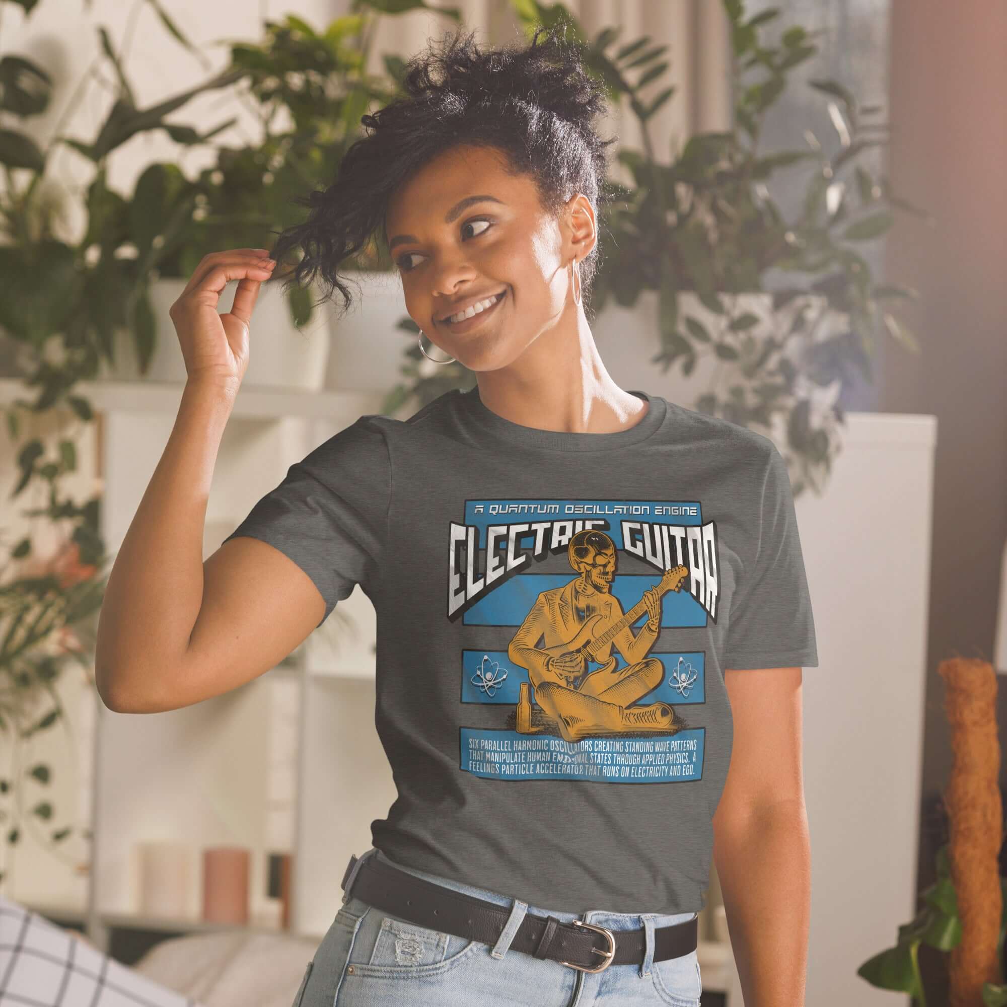 Woman wearing Electric Guitar Quantum Oscillation Engine T-Shirt, blending physics and music humor with unique graphic design.