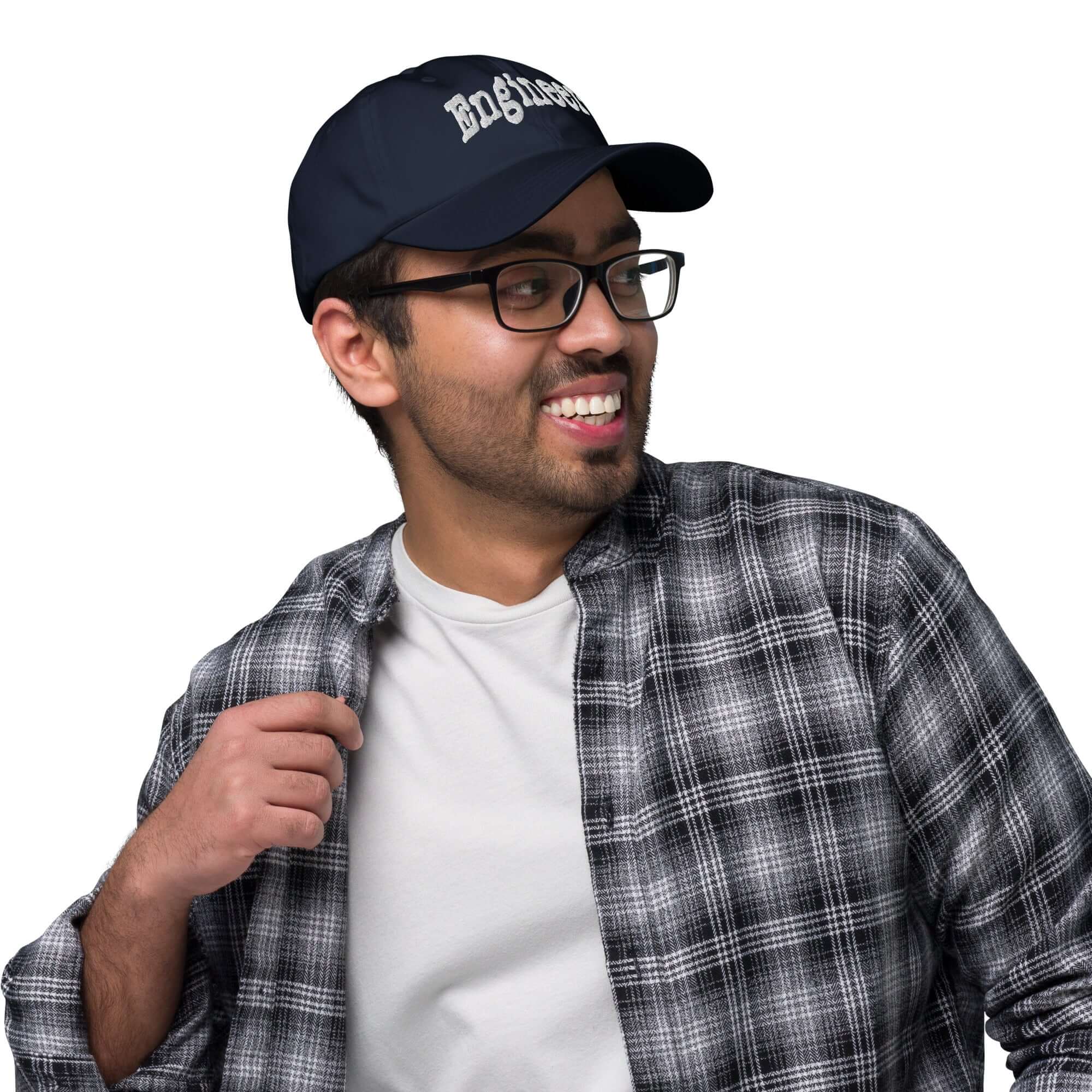 Man wearing Engineer baseball cap, showcasing professional problem-solving headwear style.