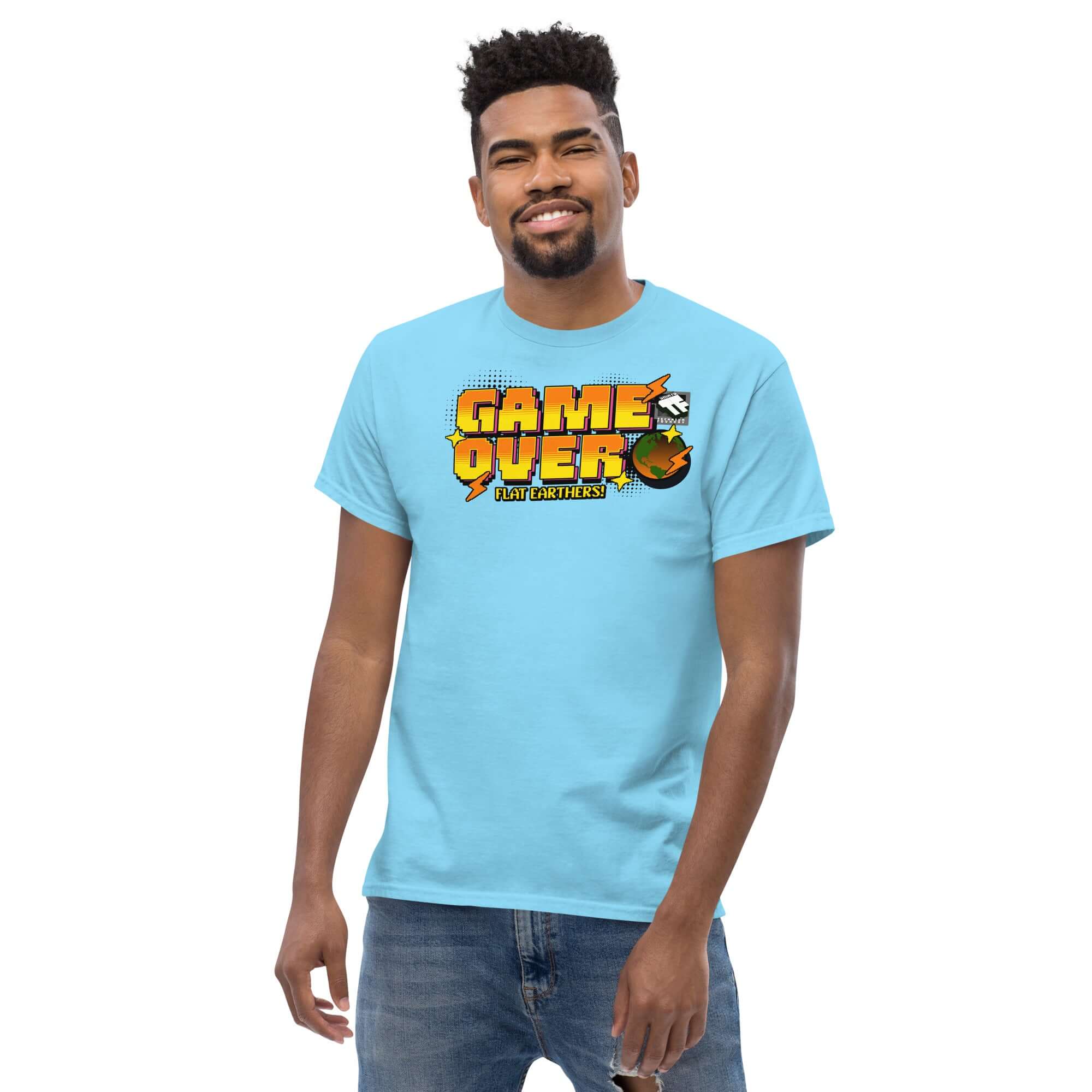Man wearing a "Game Over, Flat Earthers!" t-shirt with a pixelated Earth design in 16-bit arcade style by Technium Foundry.