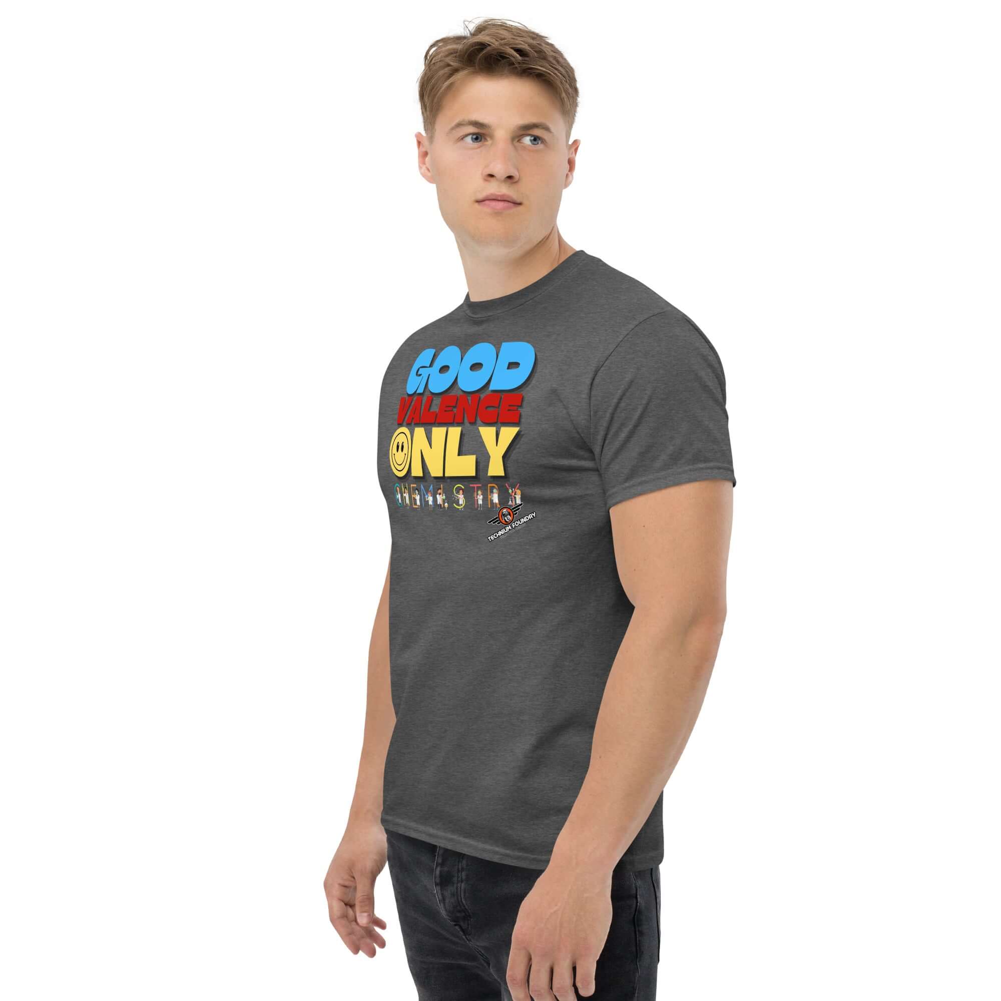 Man wearing "Good Valence Only" chemistry t-shirt with colorful retro typography and lab characters, exuding scientific humor.