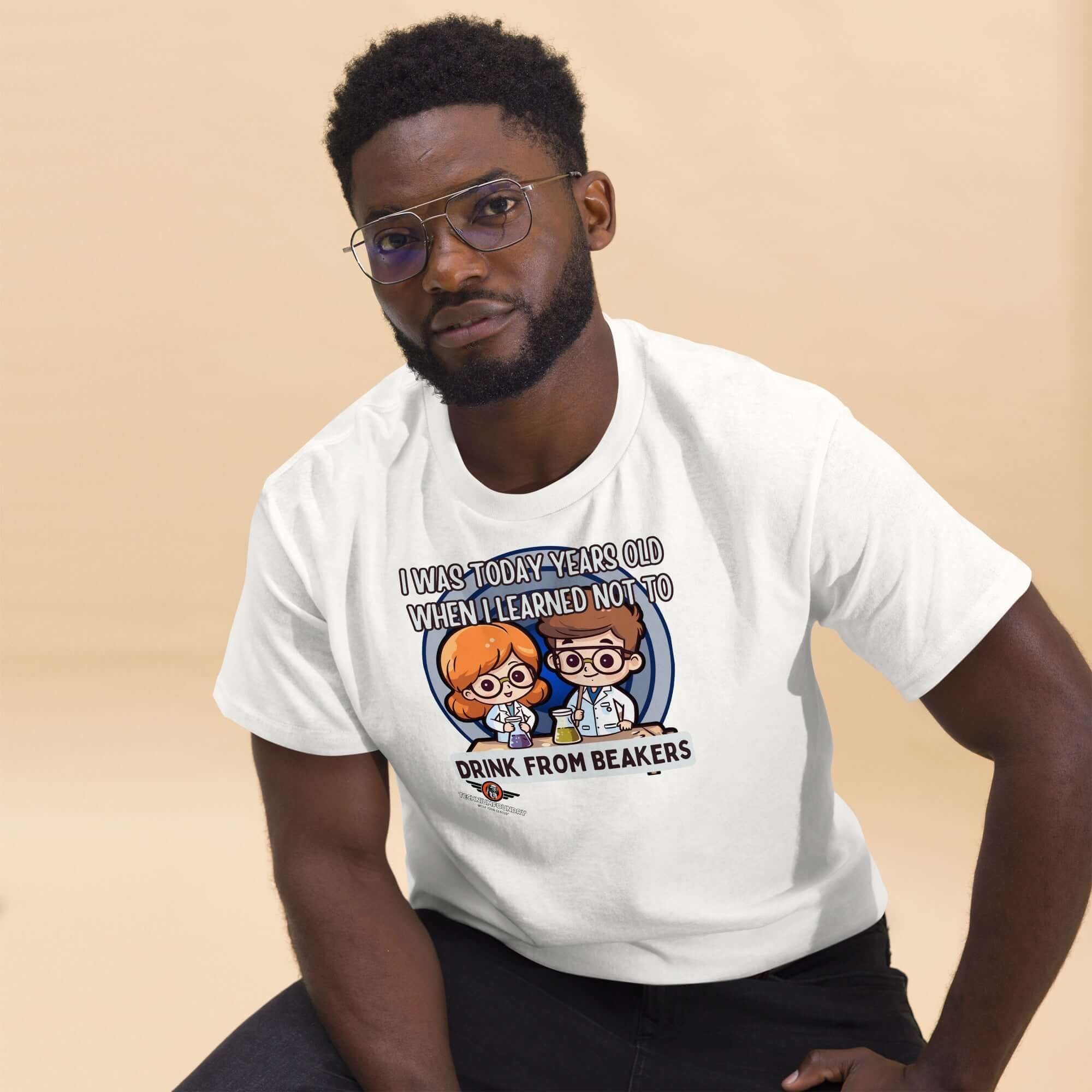 Man wearing chemistry humor T-shirt with kawaii scientists and lab safety warning "Don't Drink from Beakers"