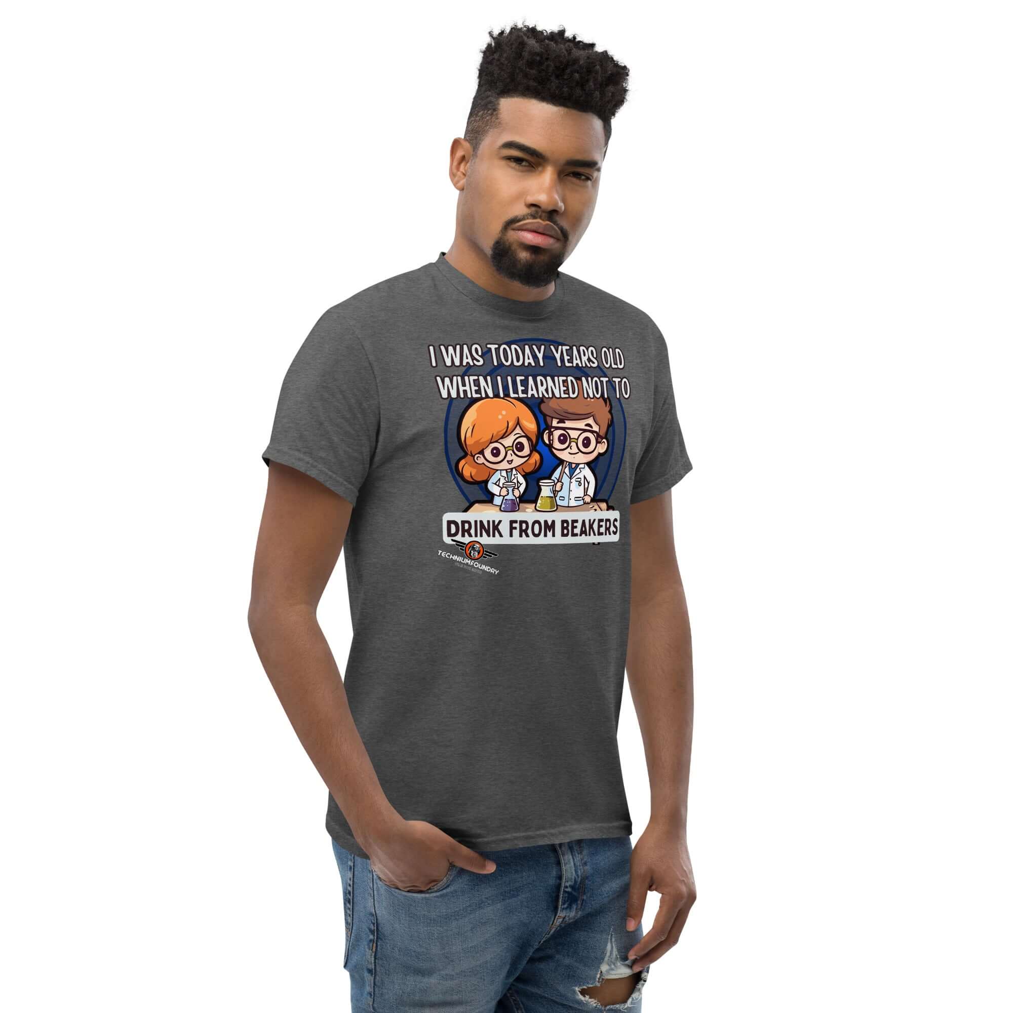 Man wearing a gray 'Don't Drink from Beakers' chemistry humor t-shirt with kawaii lab characters and safety message.