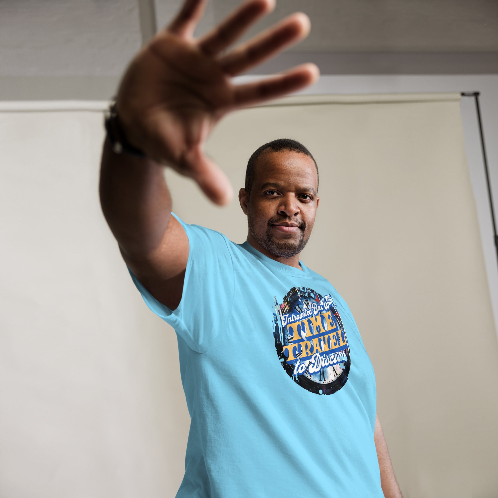 Introverted Time Travel T-Shirt featuring a vintage-inspired design about temporal paradoxes, modeled by a person gesturing.