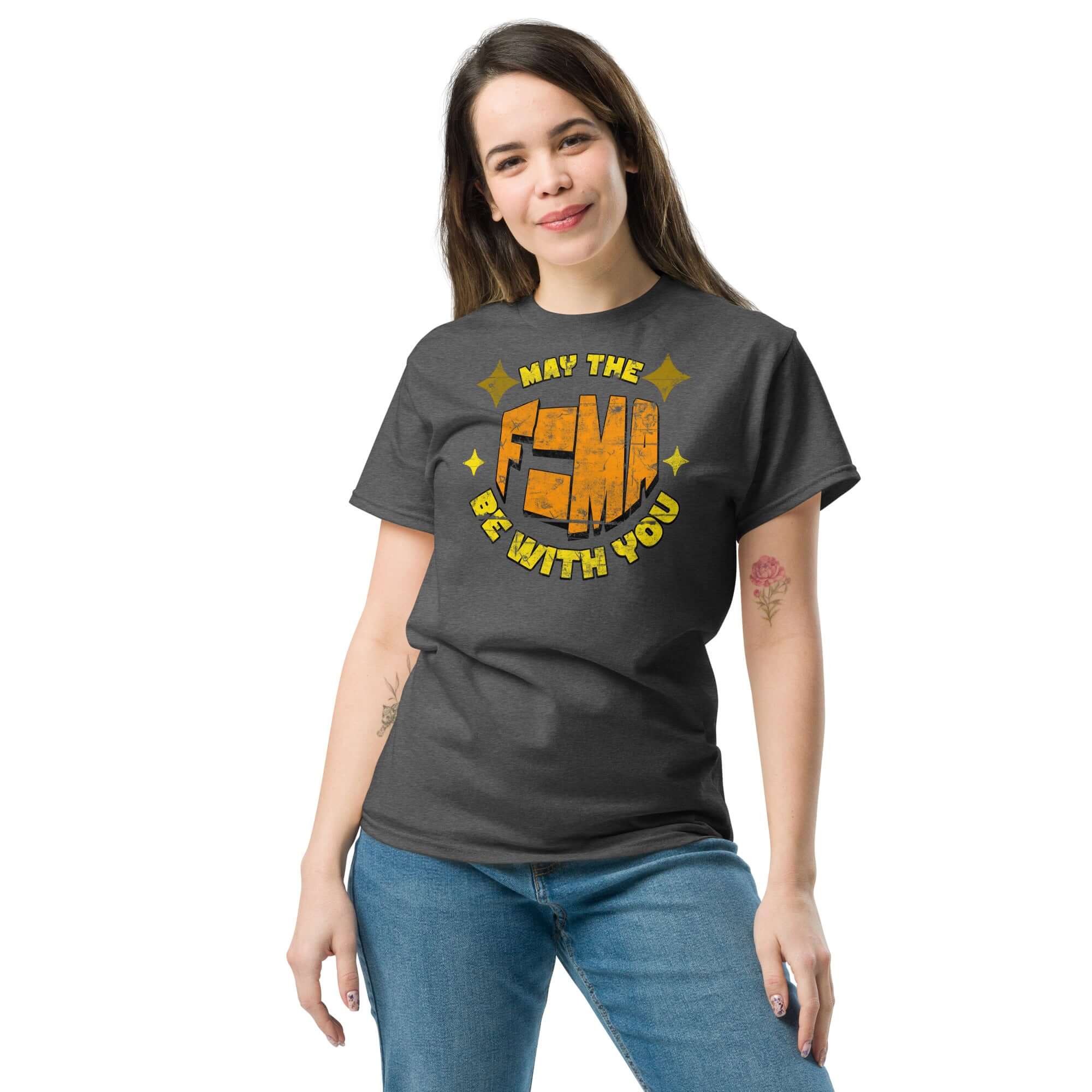 Woman wearing 'May The F=MA Be With You' physics parody t-shirt, combining science and sci-fi themes.