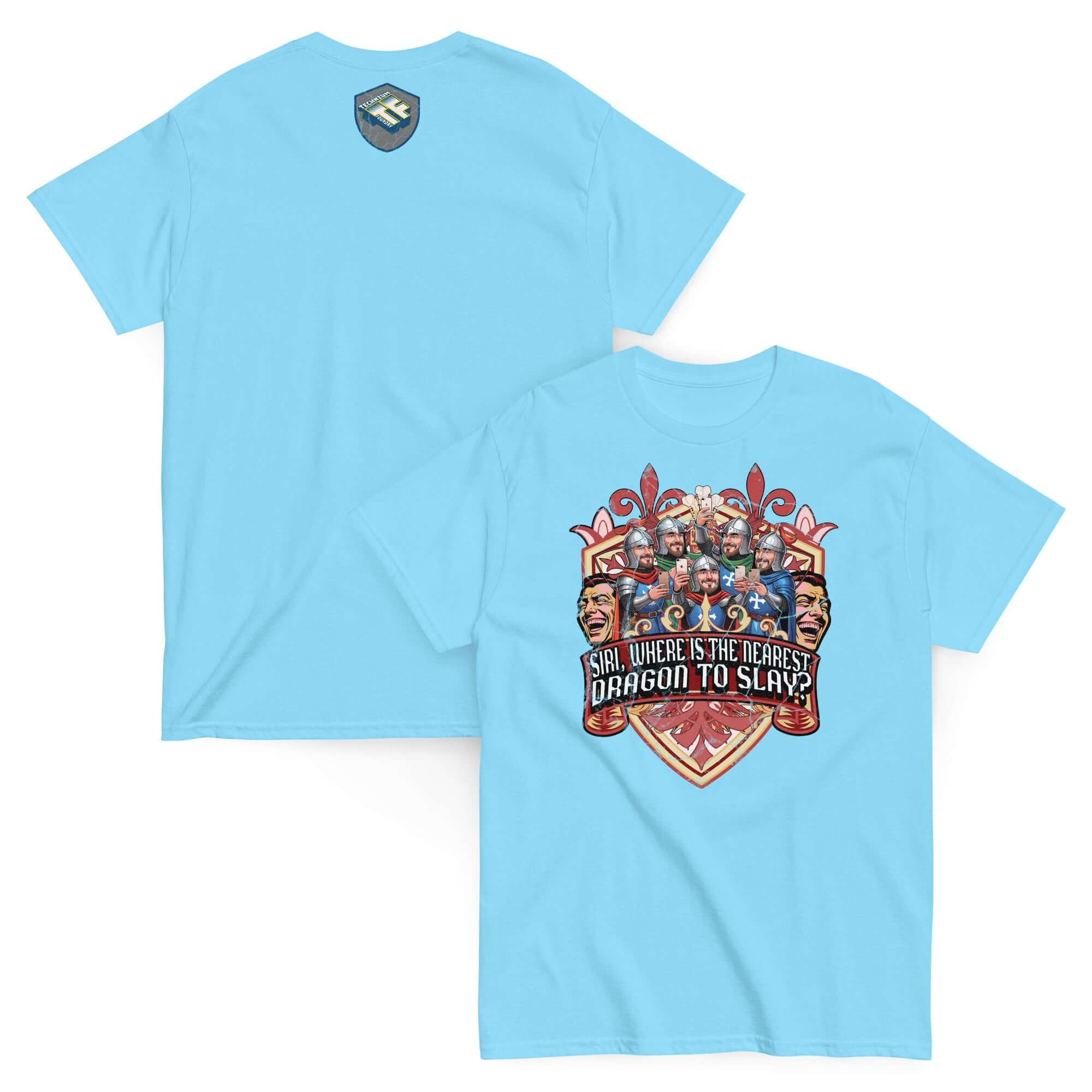 Blue T-shirt with medieval knights holding smartphones on a heraldic shield, featuring text 'SIRI, WHERE IS THE NEAREST DRAGON TO SLAY?'.