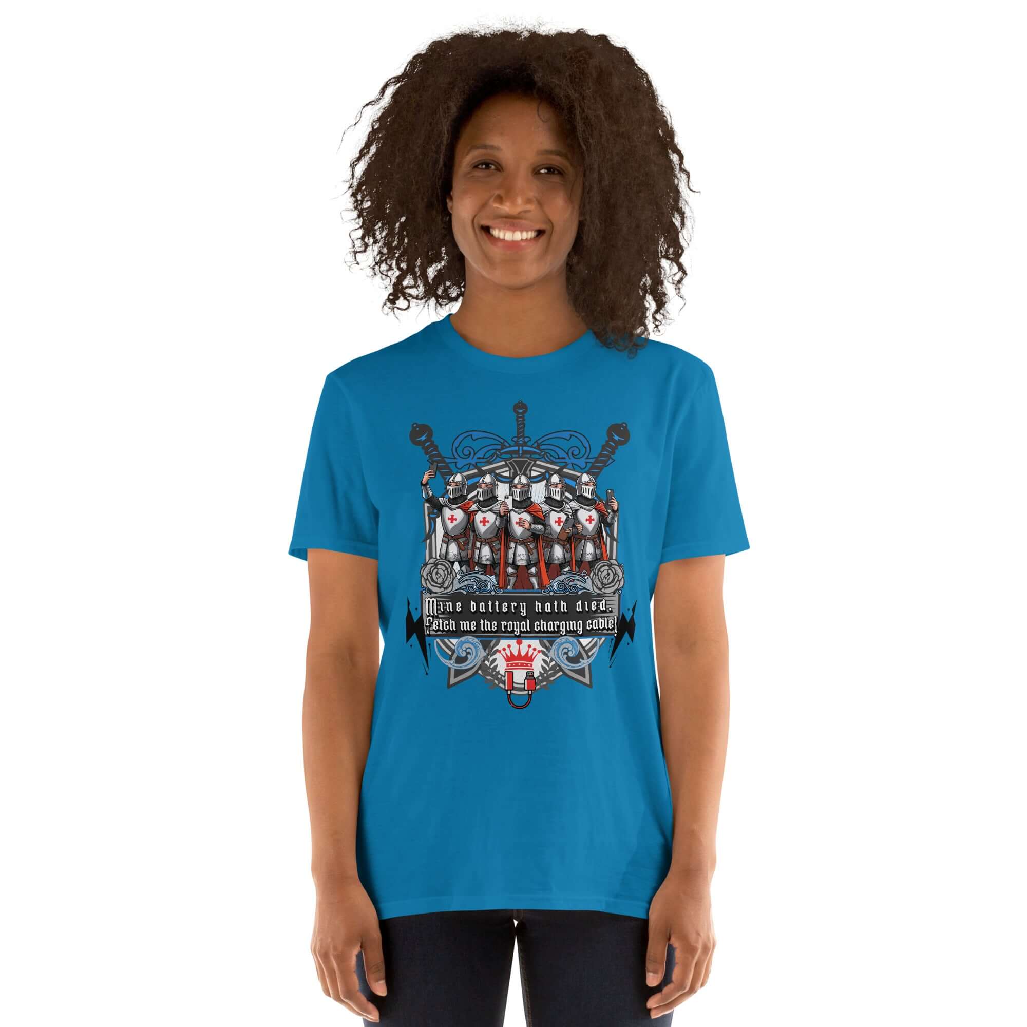 Model wearing "Mine Battery Hath Died" medieval knights tech t-shirt with heraldic shield design and crusader knights illustration.