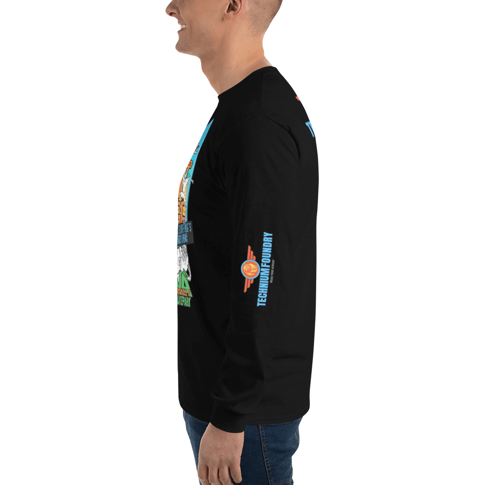 Side view of man wearing black Kona Agent Orange Long Sleeve T-Shirt with vibrant skateboarding graphics.