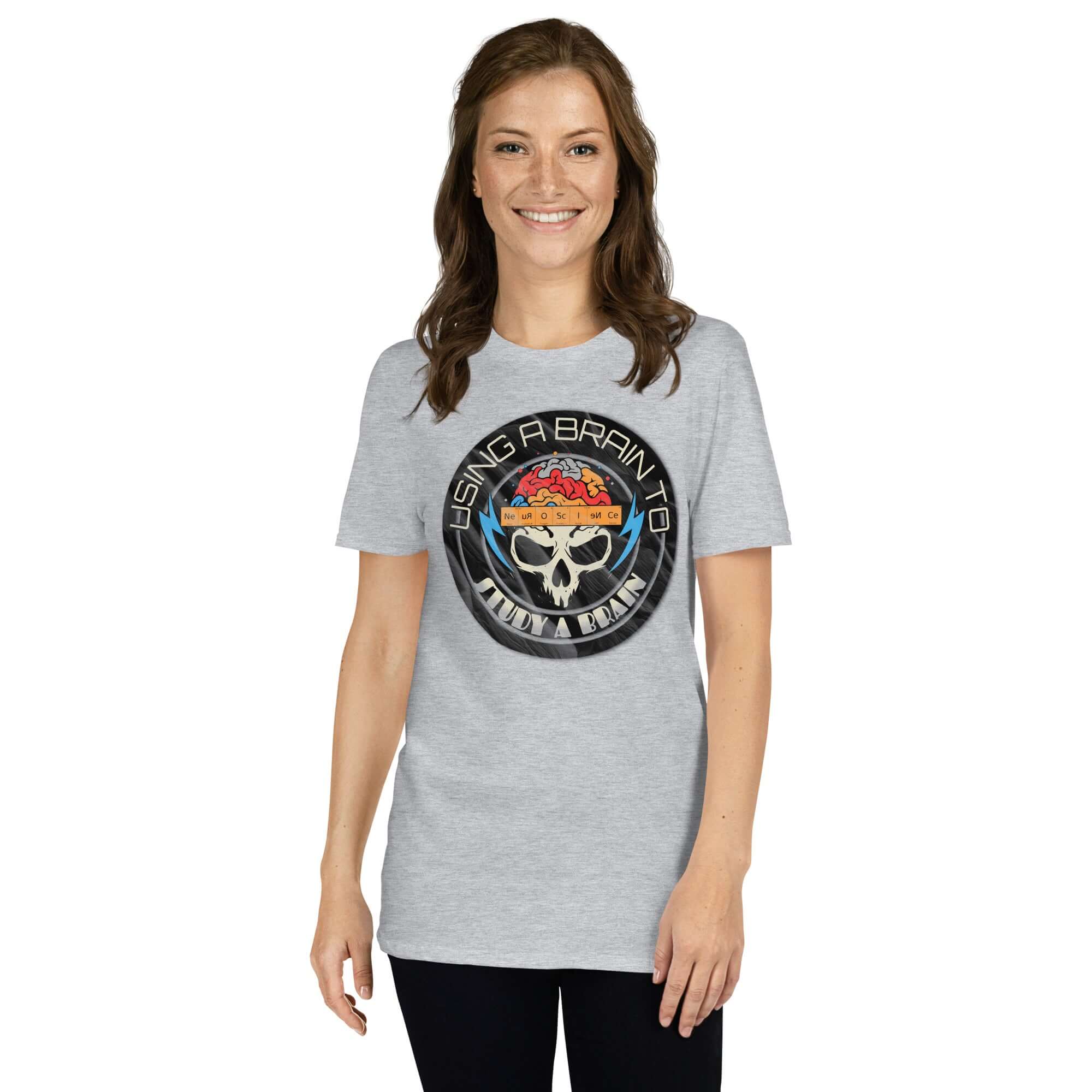 Woman wearing a gray neuroscience t-shirt with 'Using A Brain To Study A Brain' skull and brain design, science humor theme.