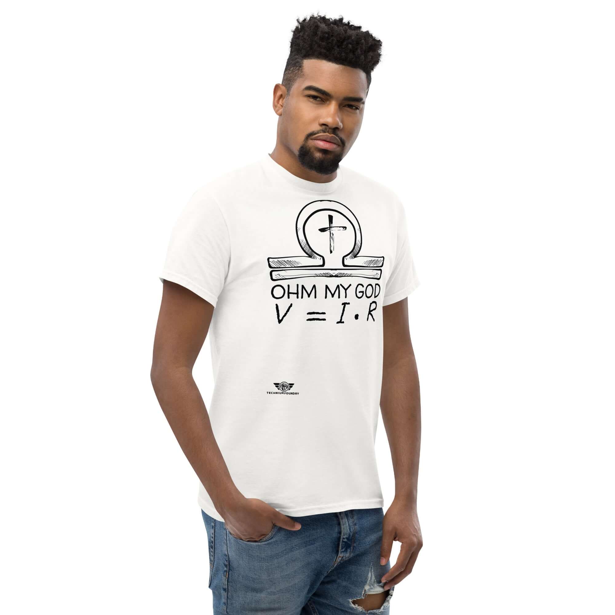 Man wearing 'Ohm My God' T-shirt with Ohm's Law design, featuring an ankh-omega symbol, blending physics and faith humorously.