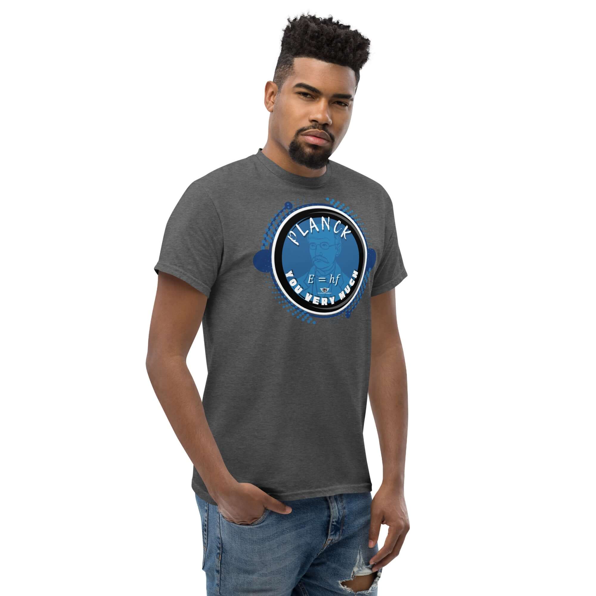 Man wearing a gray t-shirt with 'Planck You Very Much' design, featuring Max Planck and E=hf energy formula in blue tones, expressing quantum humor.