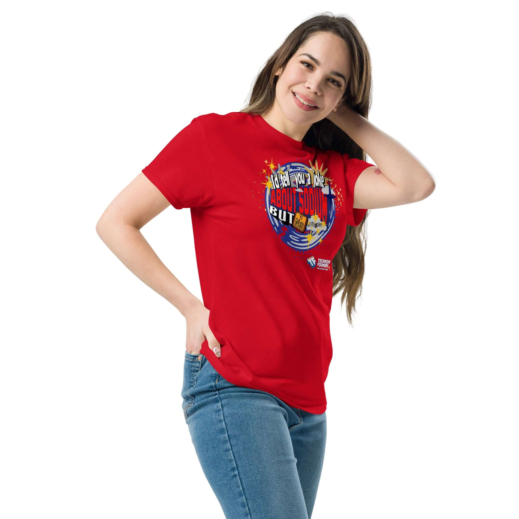 Woman wearing a red Sodium Chemistree t-shirt with periodic table humor and cosmic blue swirl design.