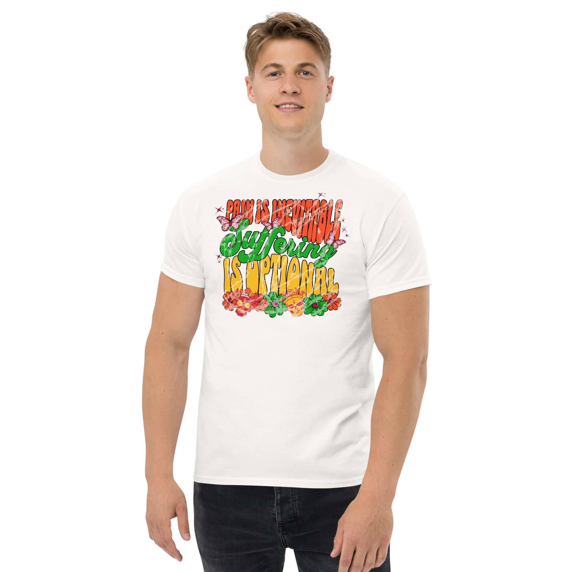 Man wearing 'Pain Is Inevitable, Suffering Is Optional' Stoic Philosophy T-Shirt with colorful psychedelic street art design.