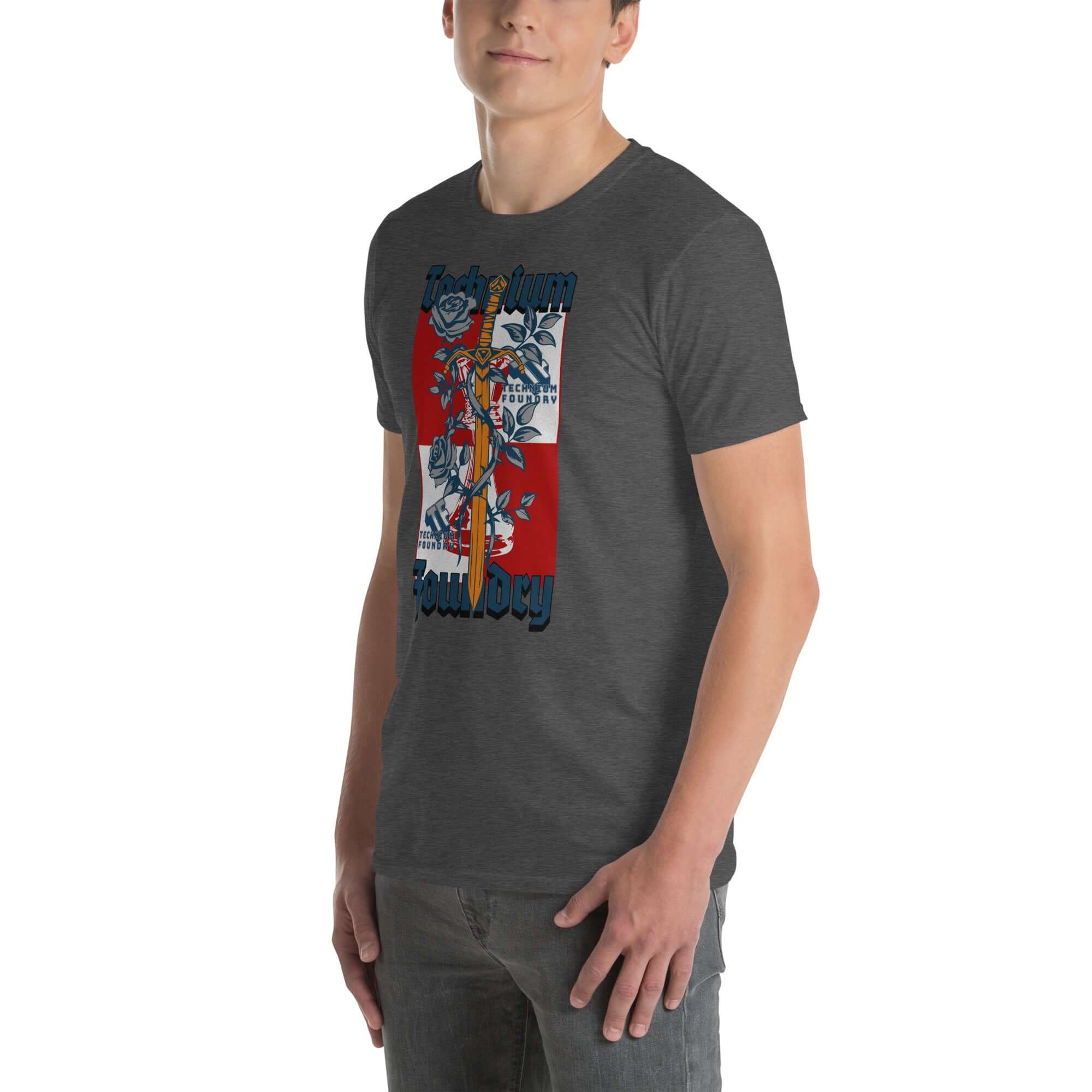 Man wearing Technium Foundry Logo T-Shirt in vibrant orange, showcasing an intellectual emblem design.