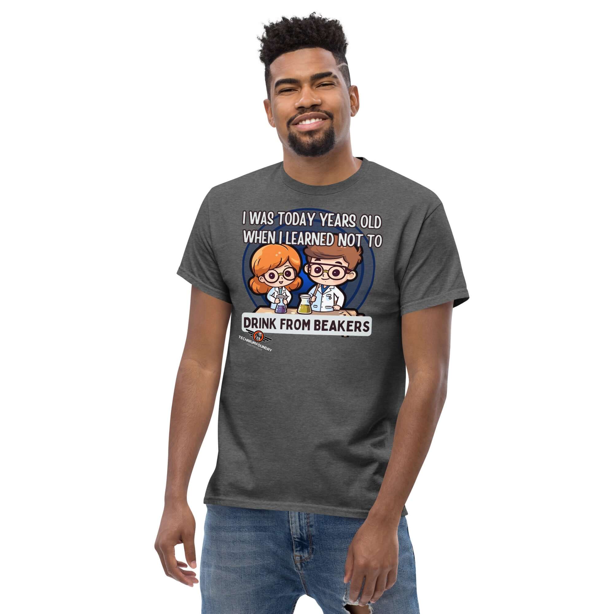 Man wearing 'Don't Drink from Beakers' t-shirt with chibi scientists, chemistry humor, safety warning, kawaii lab characters.