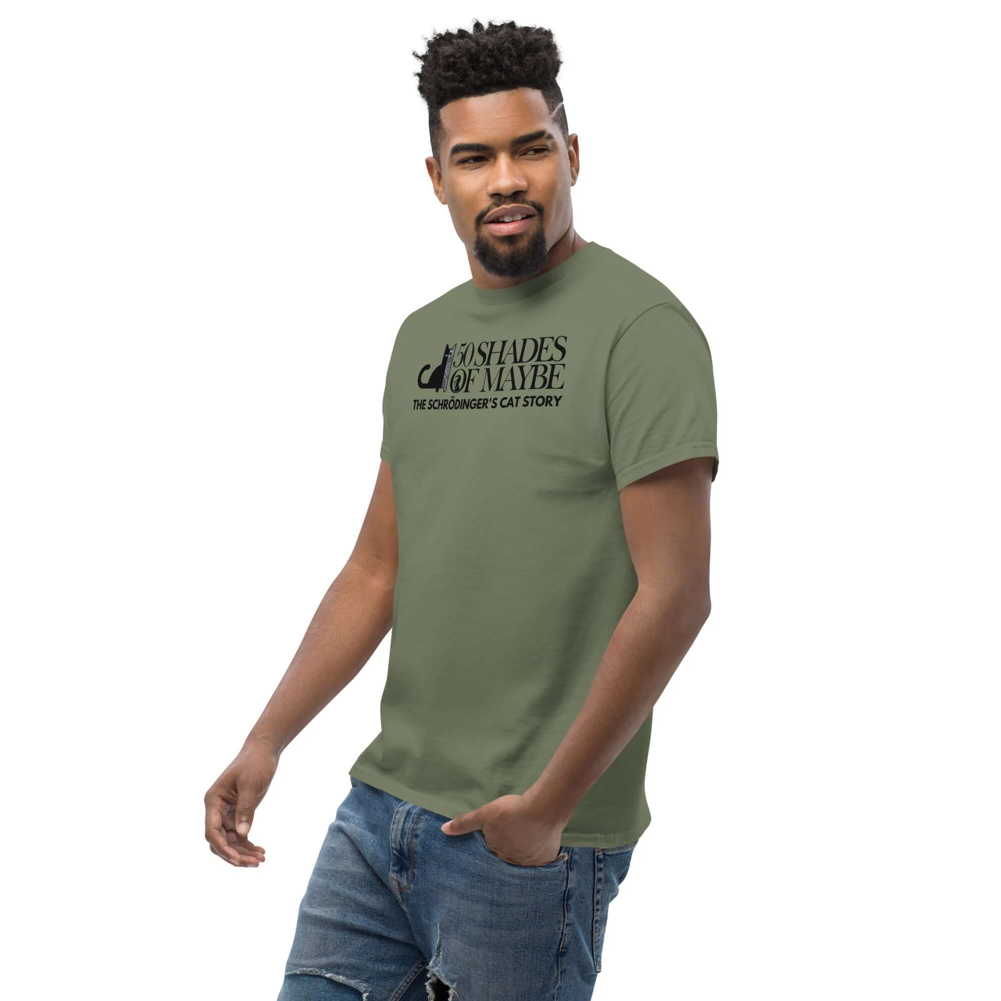 Man wearing a "50 Shades of Maybe" Schrödinger's Cat parody T-shirt, green color, quantum physics literature humor.