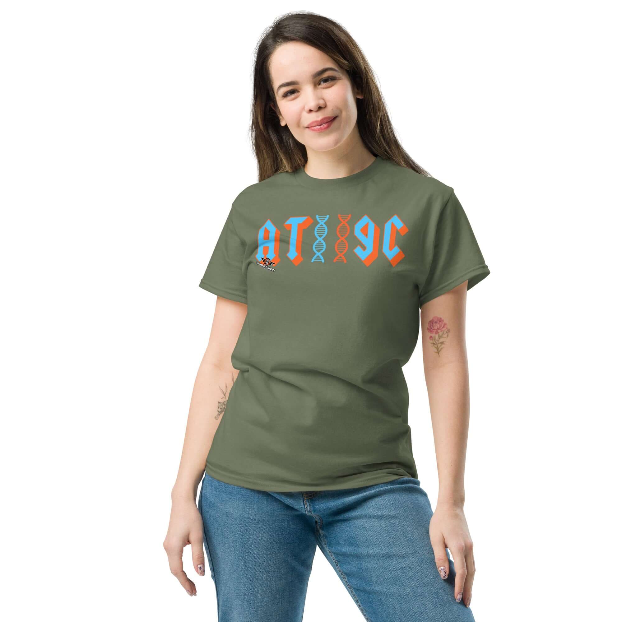 Person wearing AT/GC DNA T-shirt with heavy metal design, featuring genetic base pairs and DNA double helix. Science humor shirt.