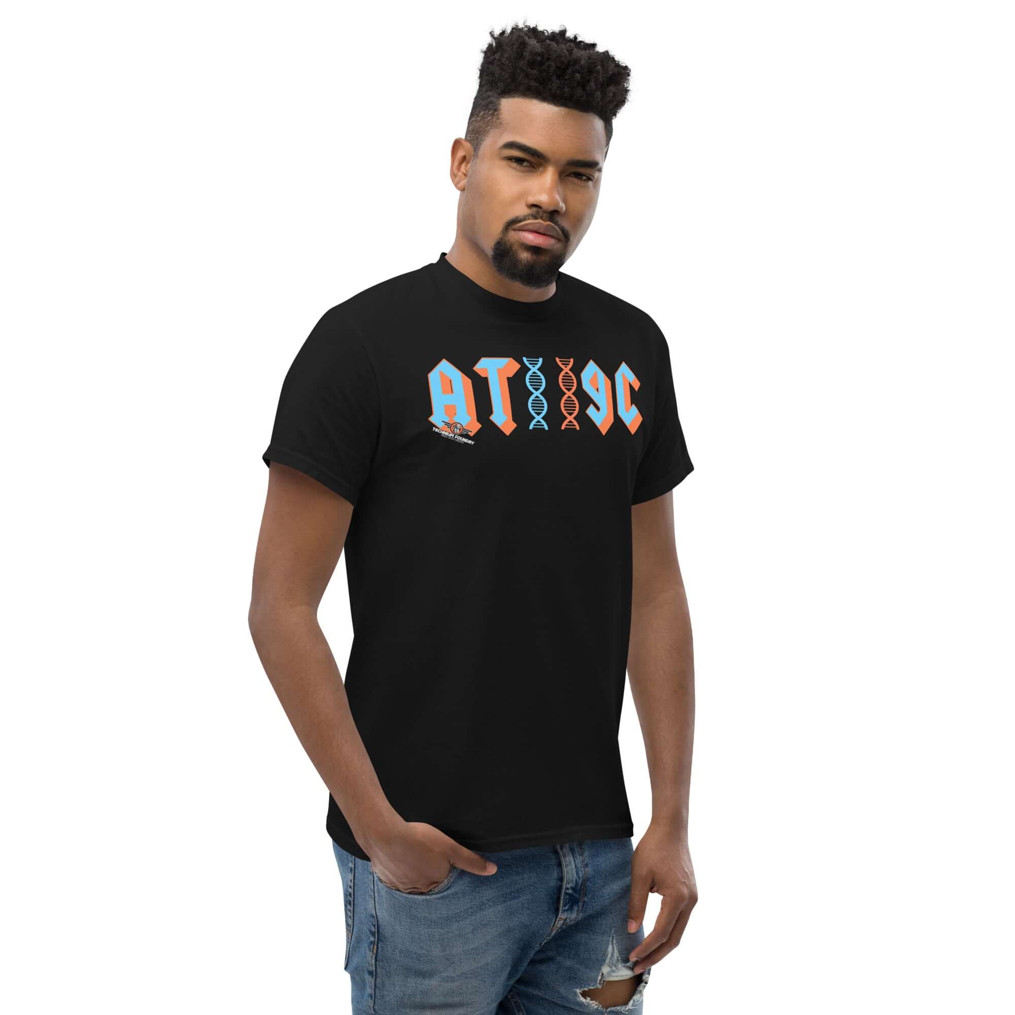 Man wearing black AT/GC Rock Band DNA T-Shirt with genetics science humor design and DNA double helix graphic.