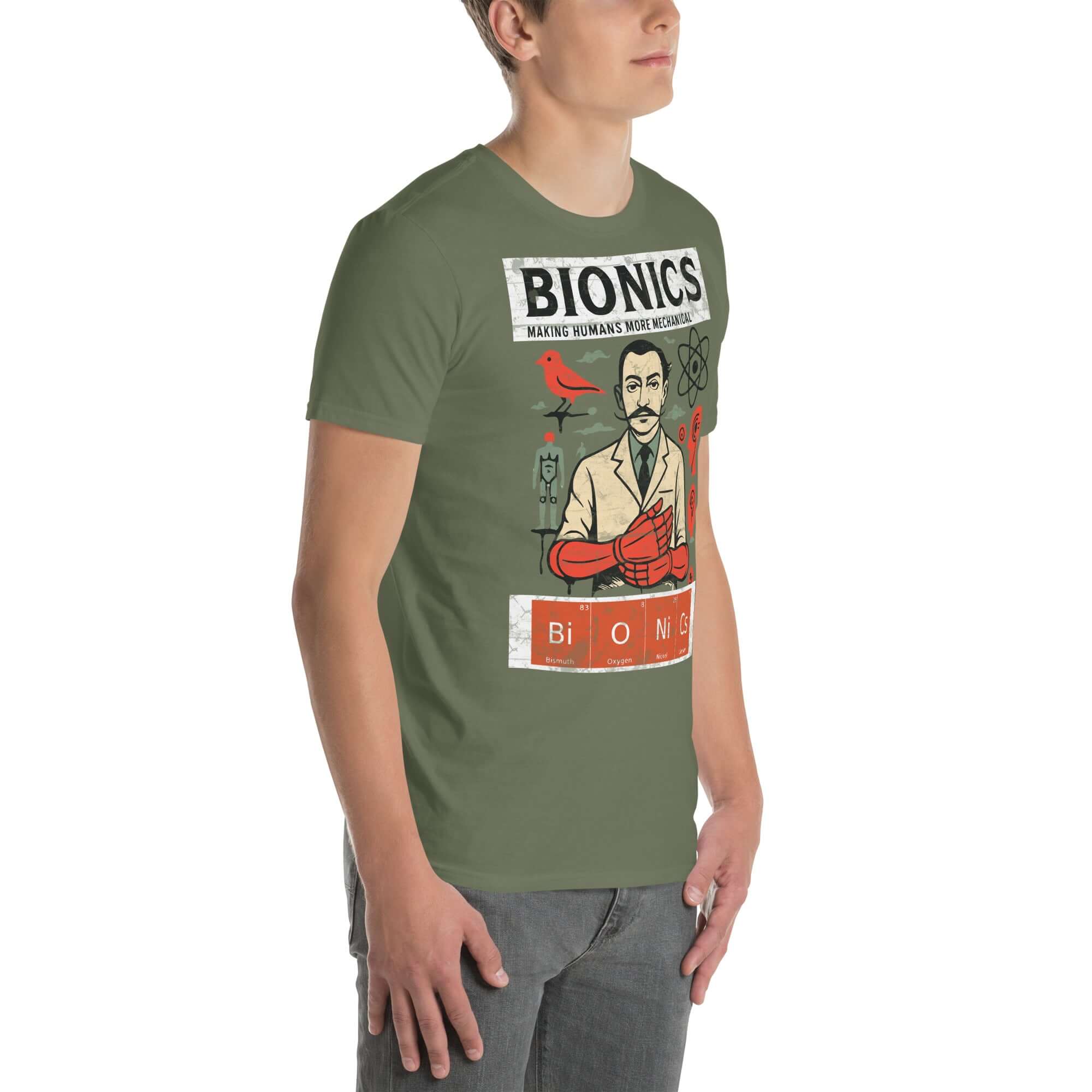 Man wearing Bionics T-Shirt featuring a vintage cybernetic laboratory design, blending human and machine elements in green color.