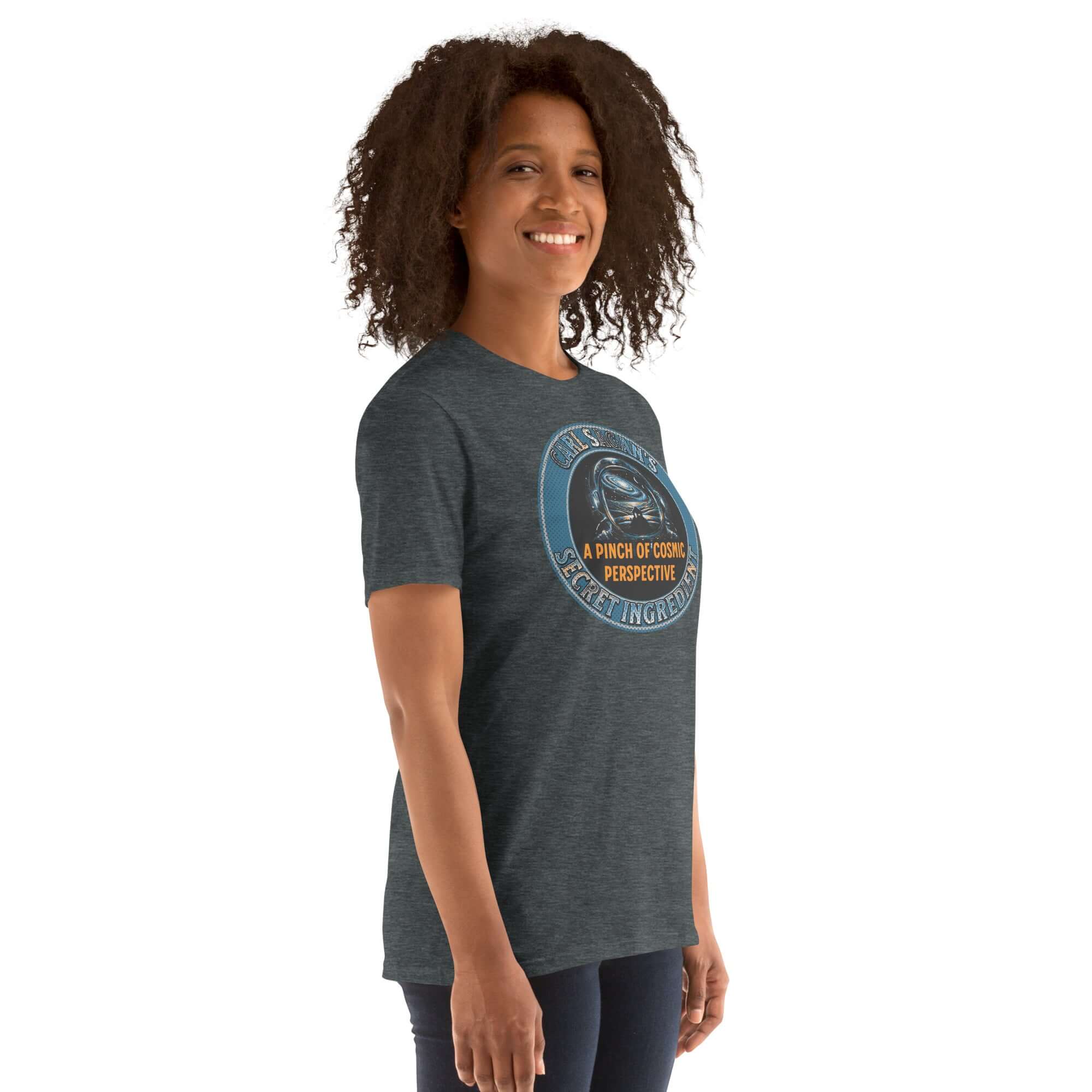 Person wearing Carl Sagan's Secret Ingredient T-Shirt with astronaut helmet and galaxy reflection design, cosmic perspective theme.