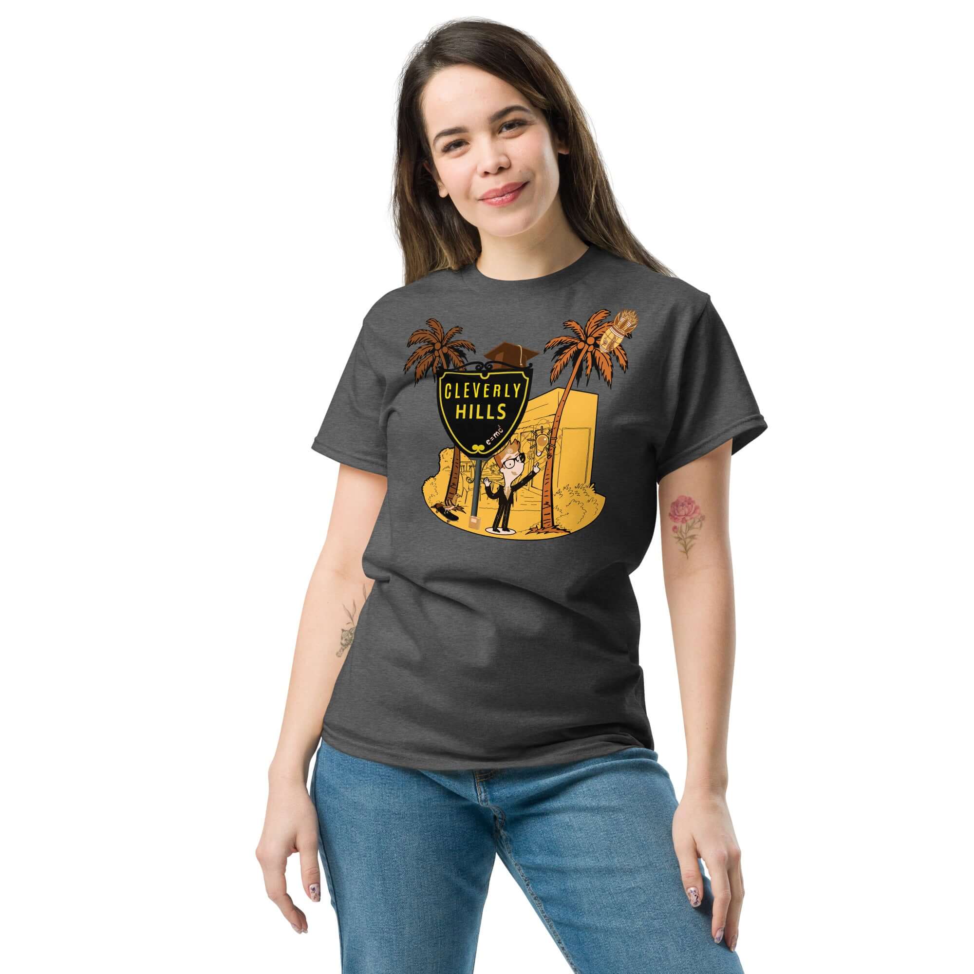 Woman wearing Cleverly Hills E=mc² T-shirt, Beverly Hills science parody design, featuring Einstein and palm trees.