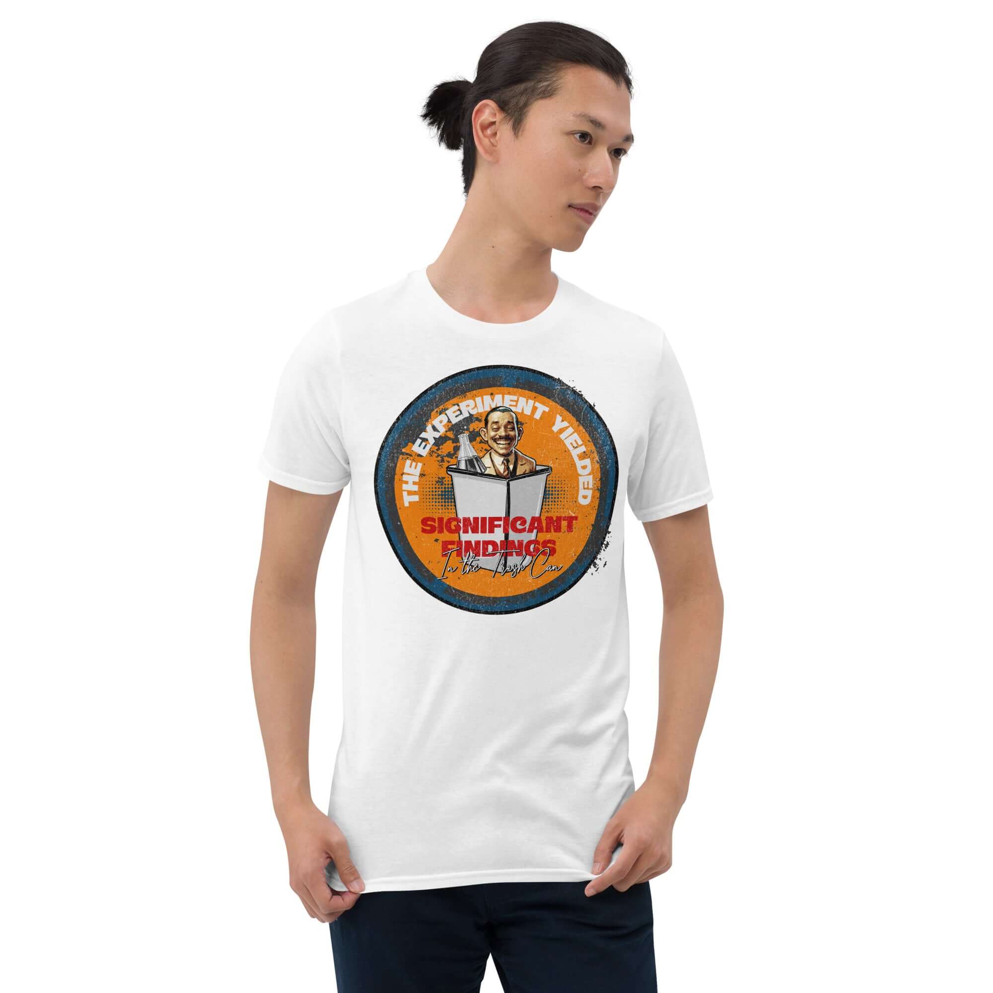 "The Experiment Yielded Significant Findings In The Trash Can" t-shirt with quirky researcher design, worn by model against white backdrop.