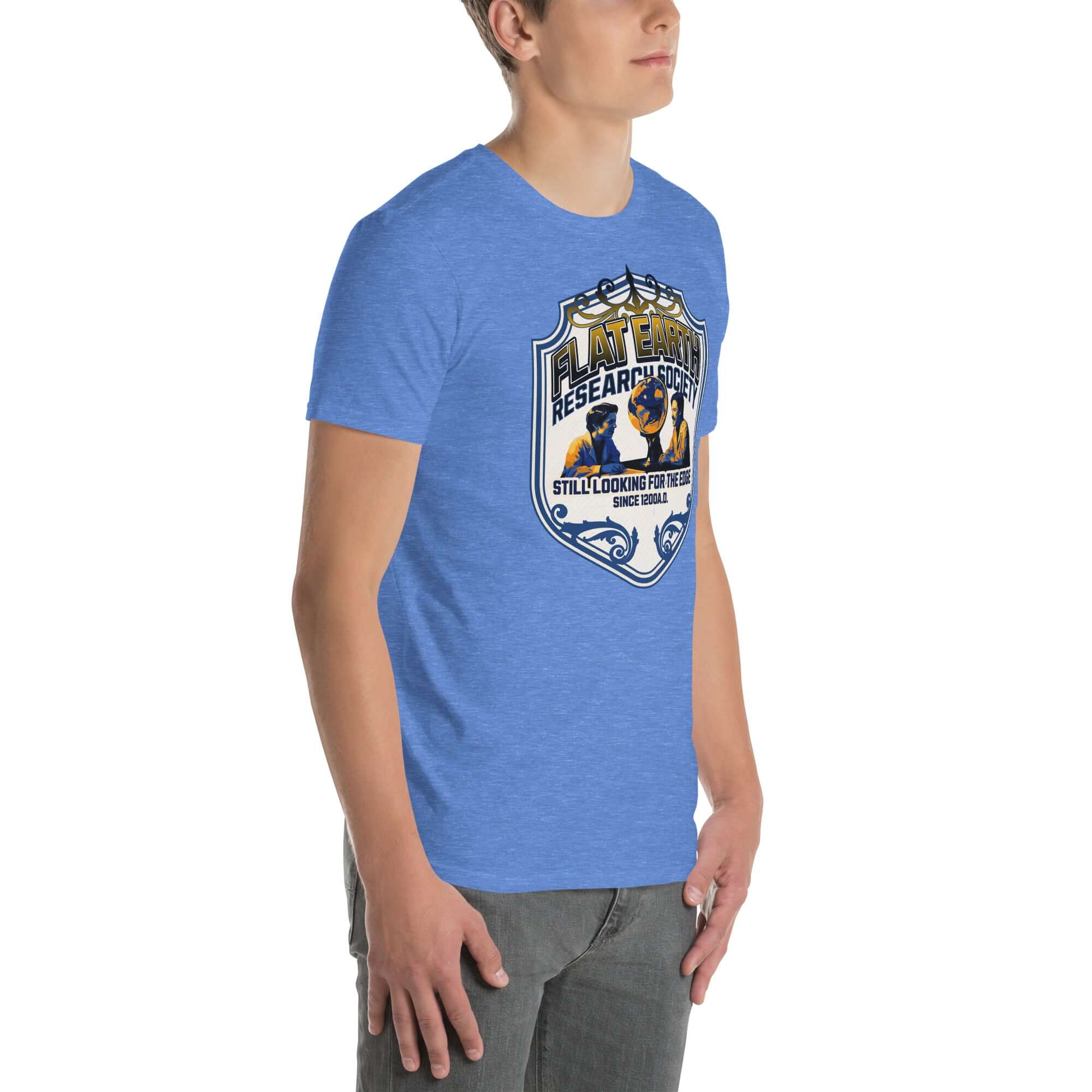 Flat Earth Research Society T-shirt in navy and gold featuring globe design on blue background, modeled by person standing sideways.