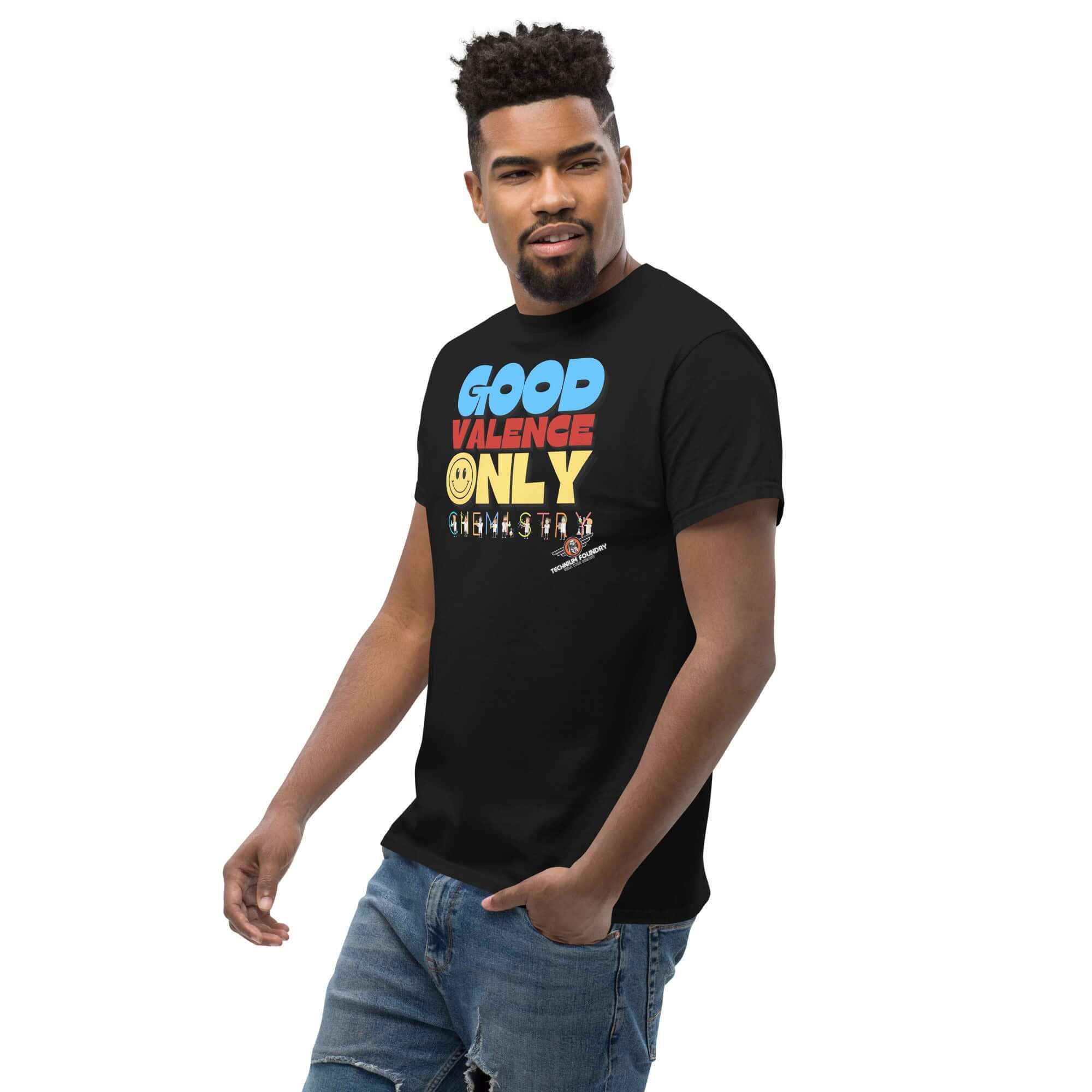 Man wearing 'Good Valence Only' chemistry t-shirt with lab scientist design, retro typography, and bright colors.