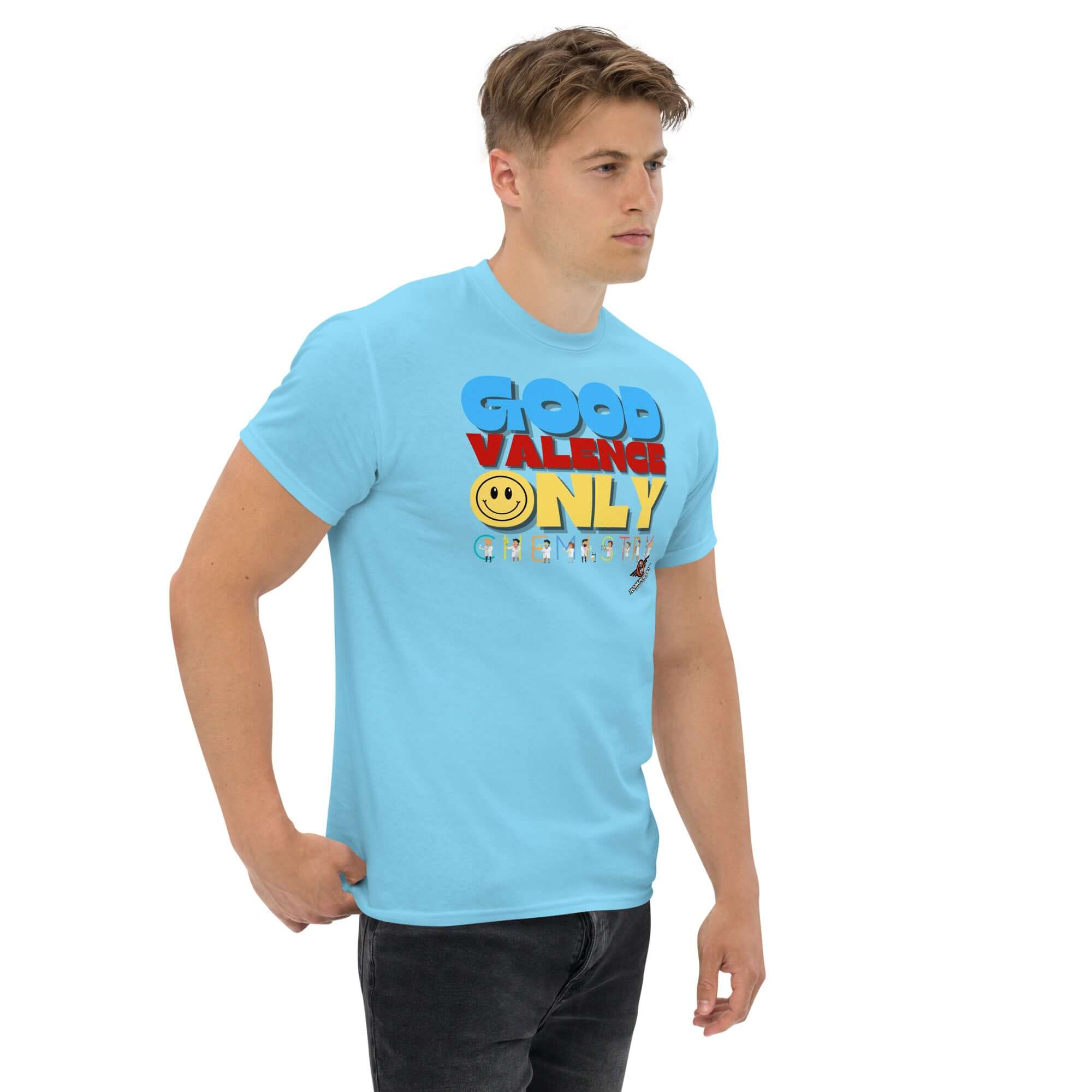 Man wearing a sky blue "Good Valence Only" chemistry t-shirt with cheerful scientists design, blending scientific humor and retro style.