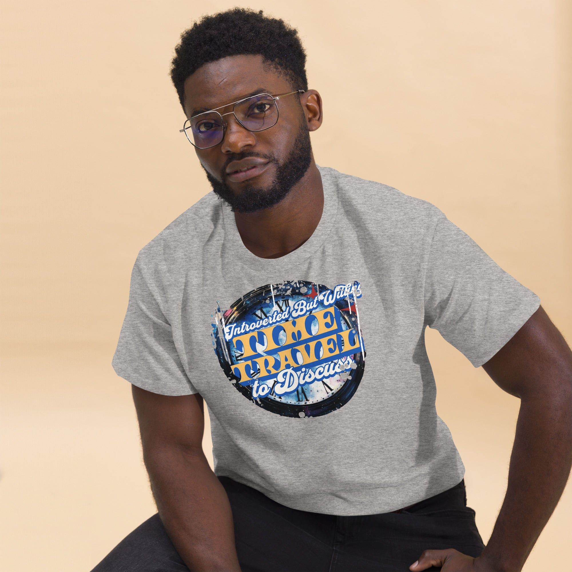 Man wearing gray Introverted Time Travel T-Shirt with vintage circular design and physics humor.
