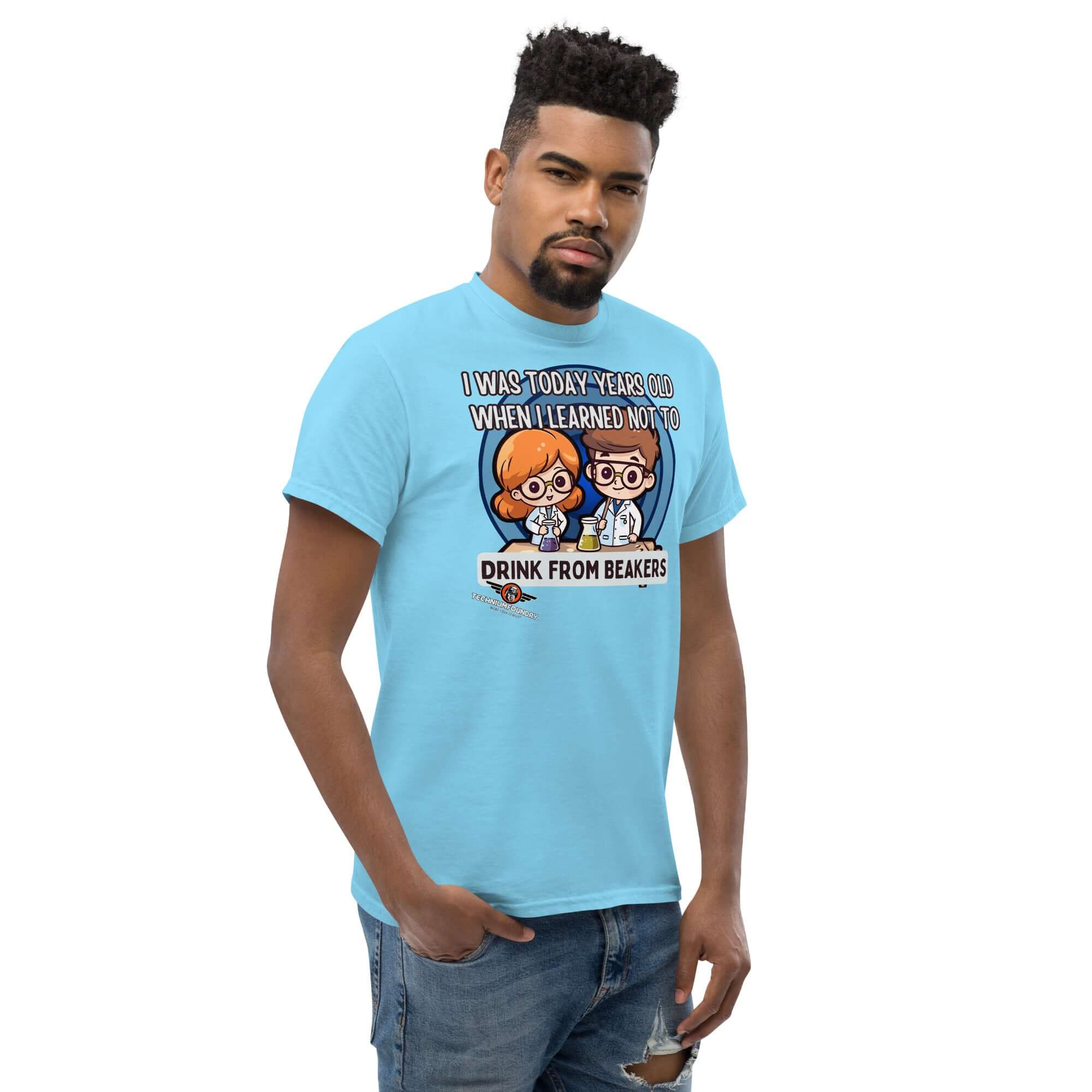 Man wearing a 'Today Years Old' chemistry humor t-shirt with chibi scientists, promoting lab safety and kawaii beaker warning design.