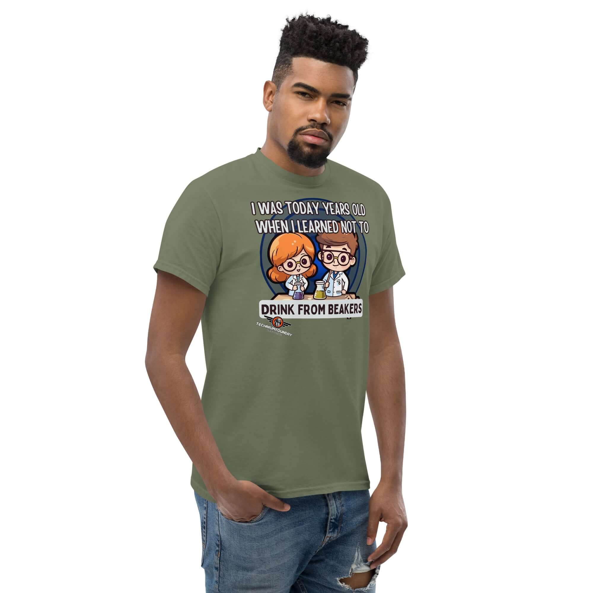 Man wearing a green 'I Was Today Years Old' lab safety t-shirt with kawaii scientists warning not to drink from beakers.