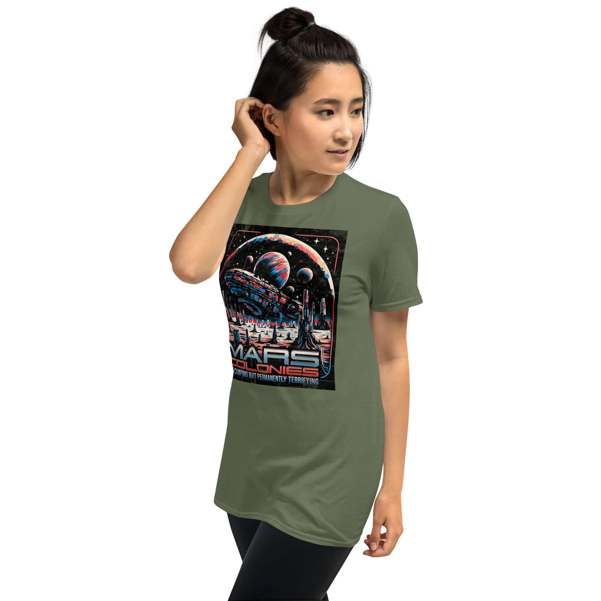 Woman wearing a Mars Colonies T-Shirt featuring a retro-futuristic design of a colony ship on a green background.