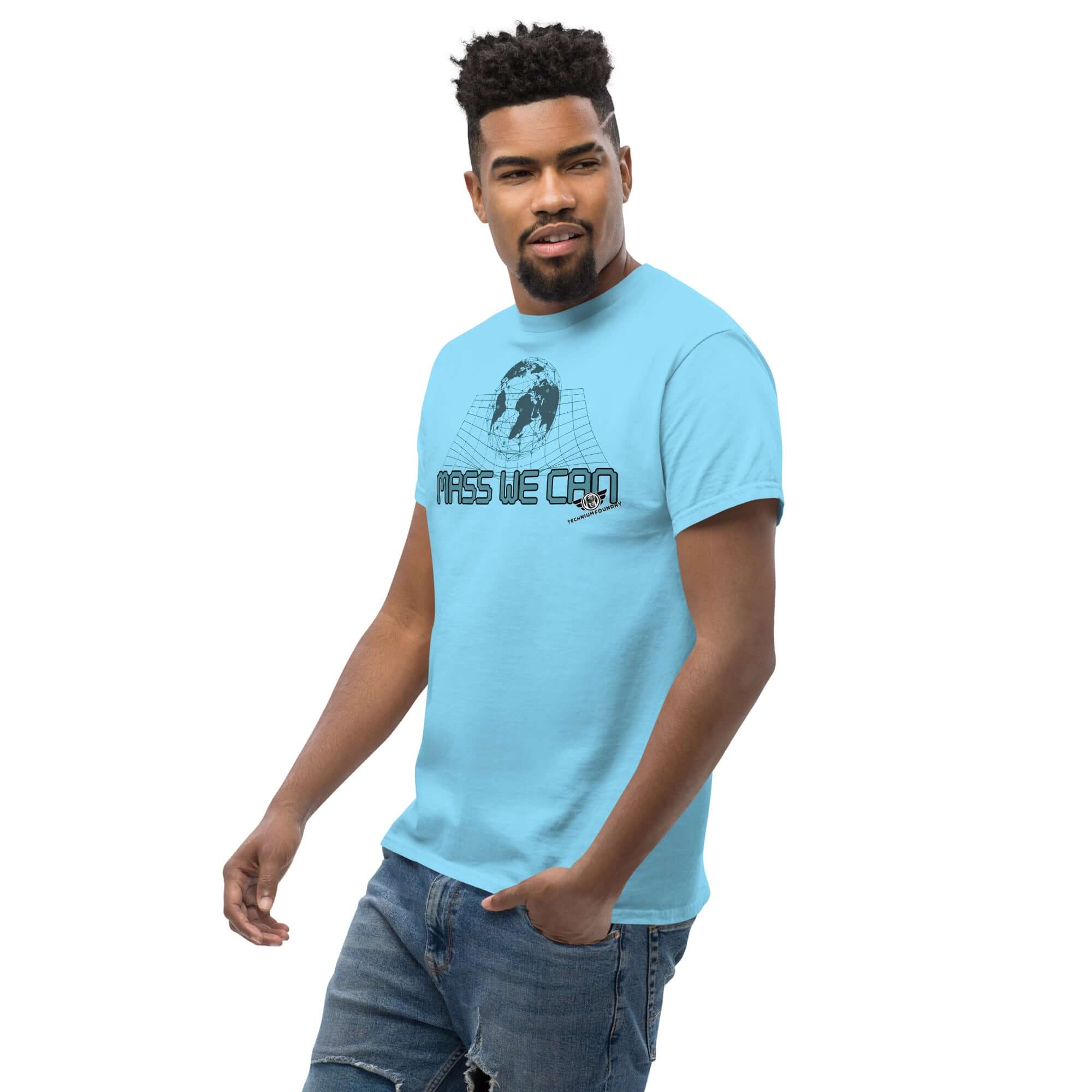 Alt Tag: Man wearing light blue 'Mass We Can' Space-Time Curvature Physics T-Shirt, showcasing Einstein's general relativity humor design.