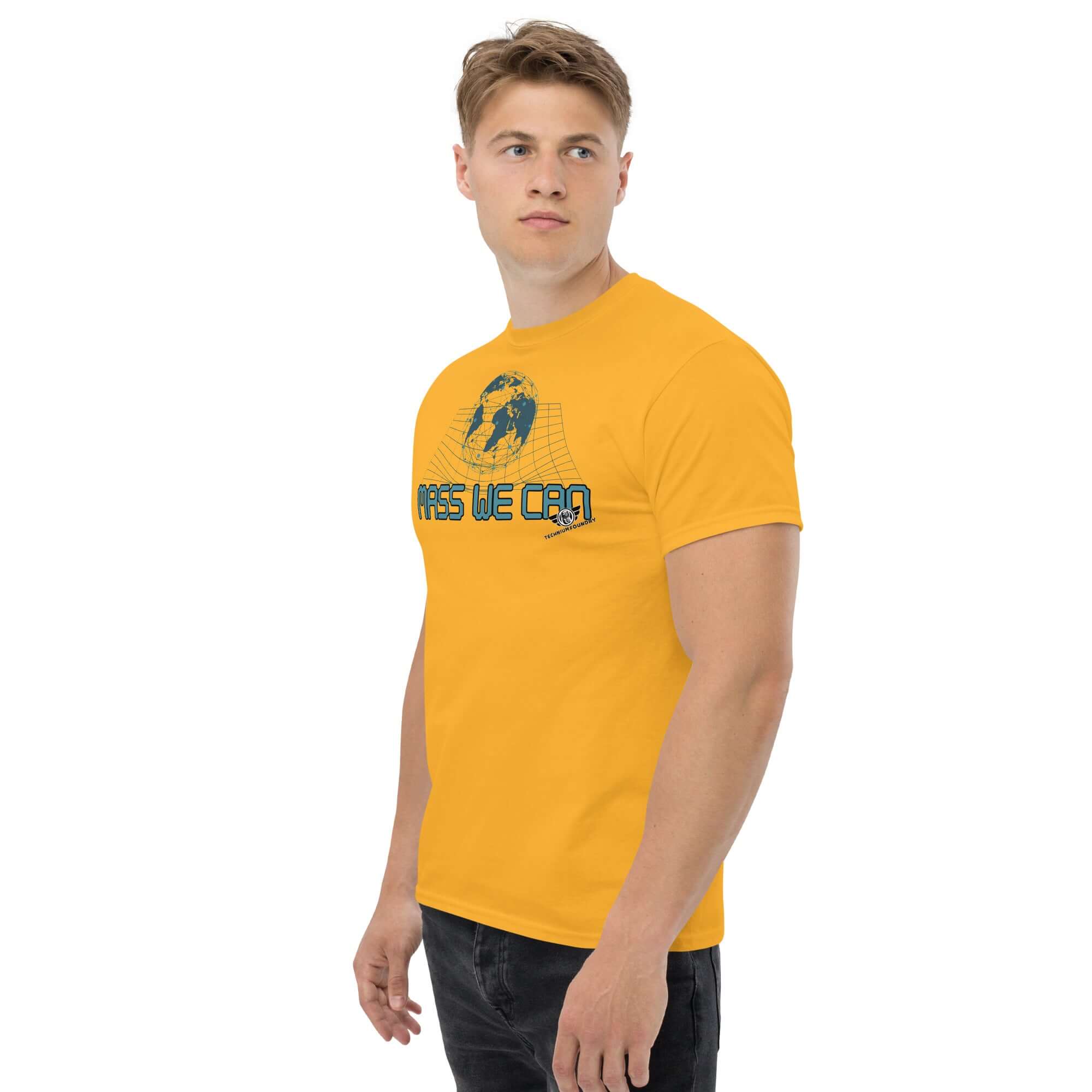 Mass We Can space-time curvature t-shirt showcasing gravitational relativity humor. Yellow shirt with geometric design.