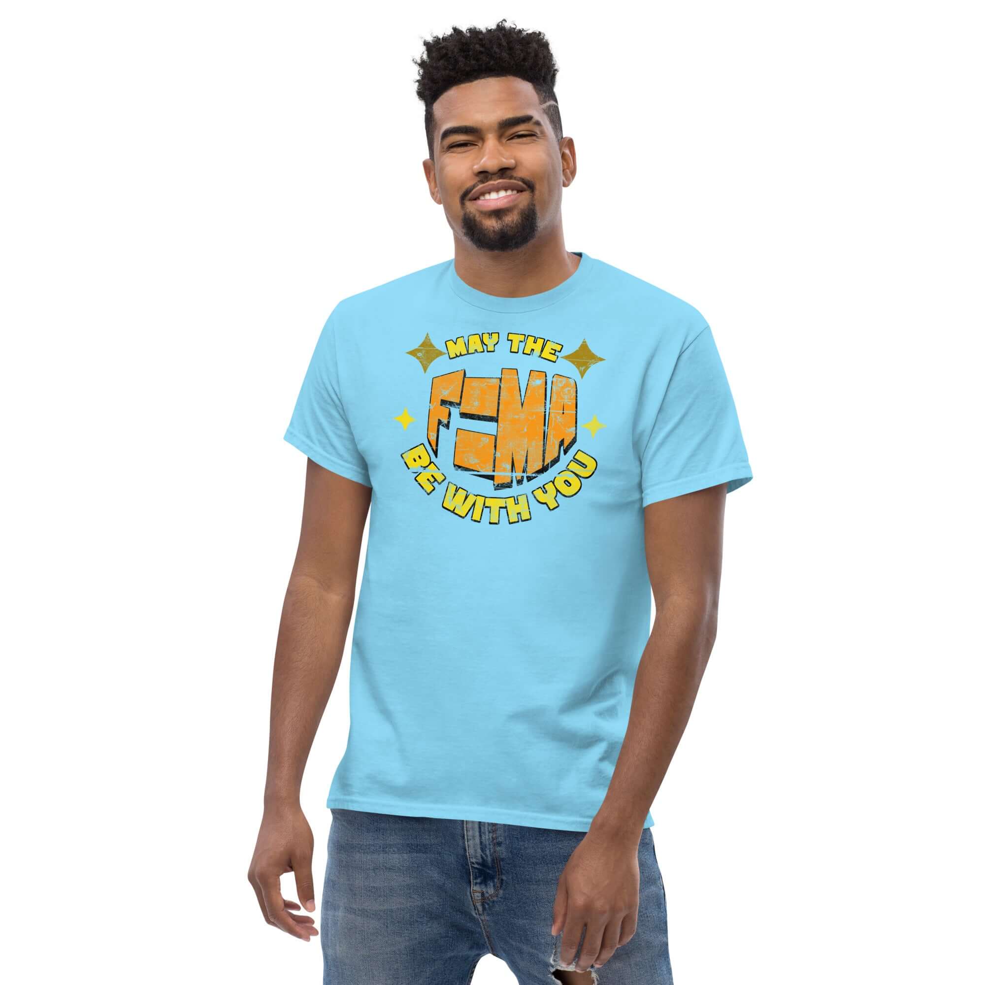 Person wearing 'May The F=MA Be With You' t-shirt, blue color, physics equation parody, Newton's Second Law, science and sci-fi mashup.