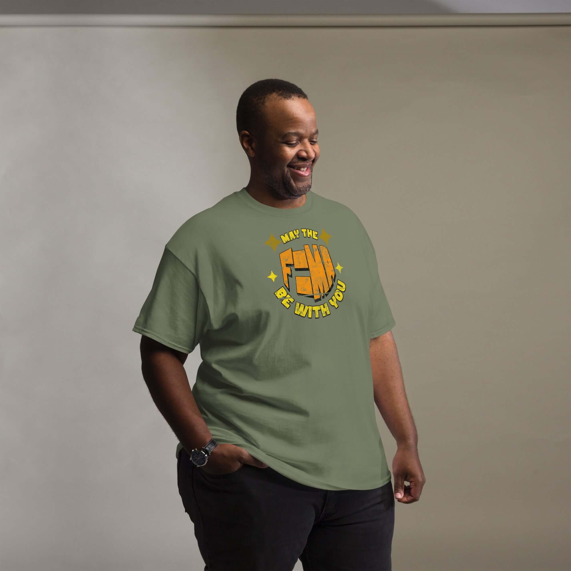 Person wearing "May The F=MA Be With You" physics parody t-shirt, expressing love for science and sci-fi with F=MA equation.