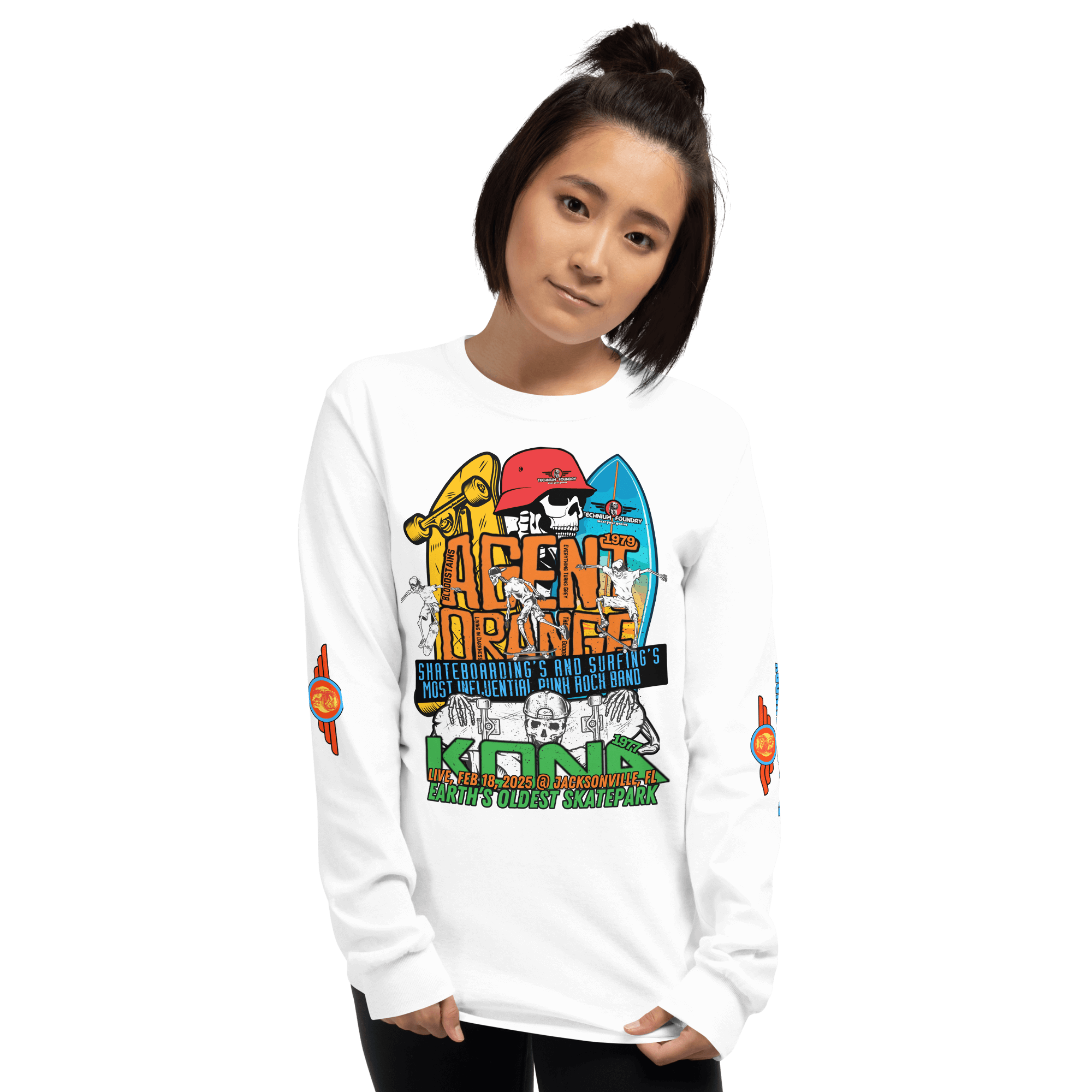 Woman wearing Kona Agent Orange long sleeve T-shirt featuring vintage skate graphics and surfboard panels.