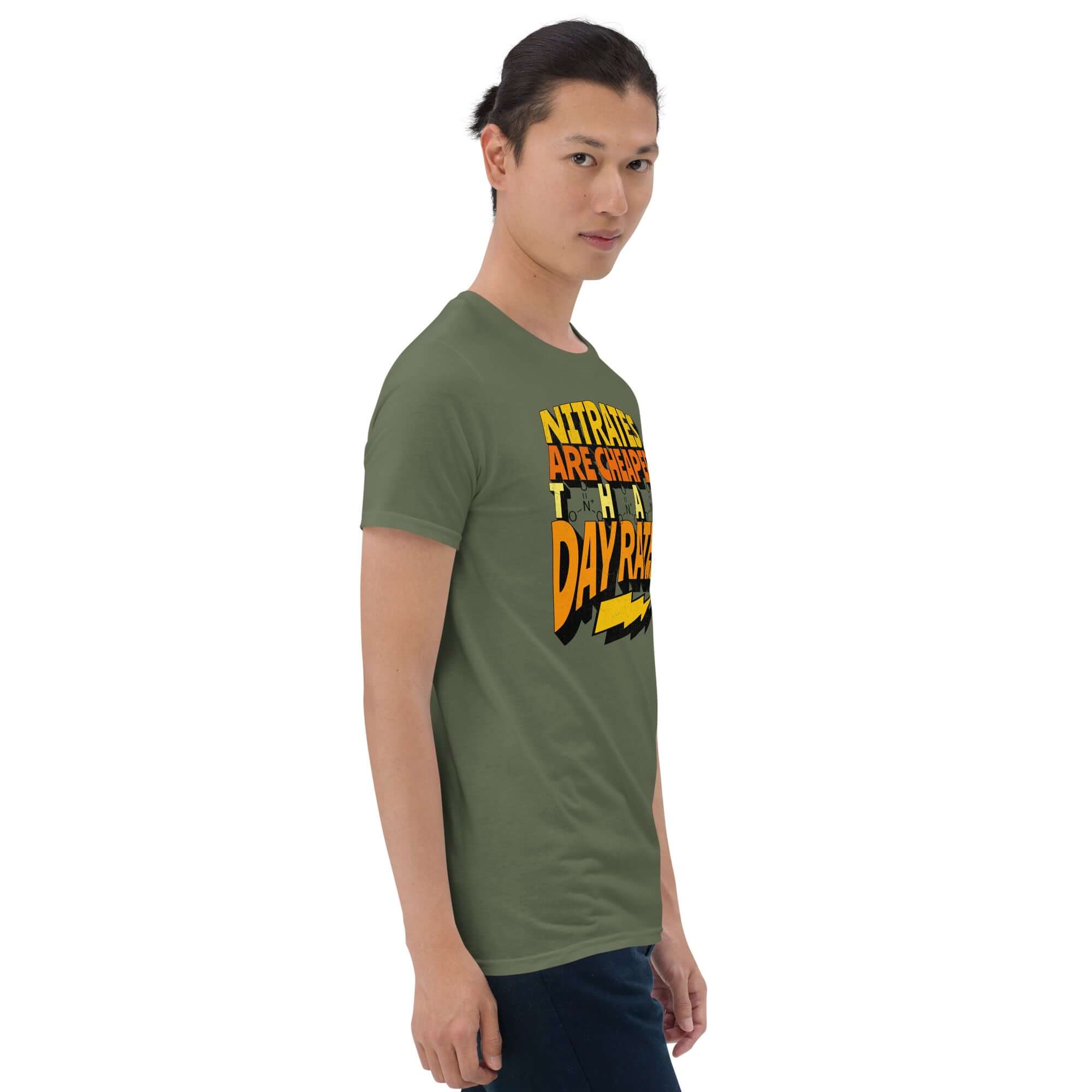 Person wearing a green t-shirt with "Nitrates Are Cheaper Than Day Rates" slogan in vibrant orange and yellow typography, chemistry humor design.