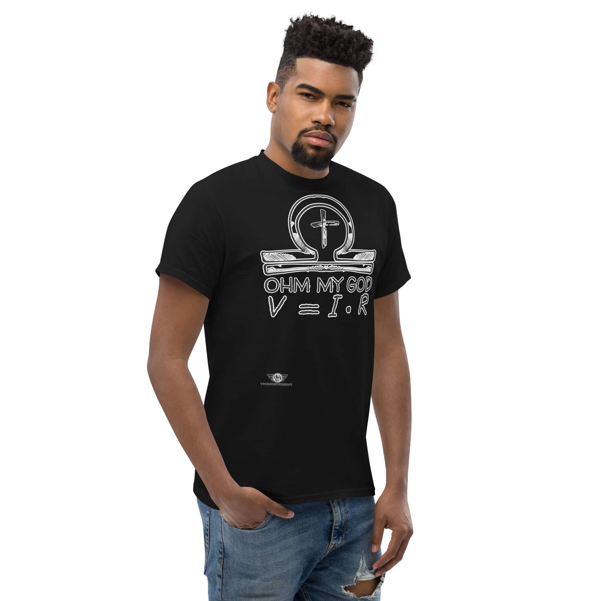 Man wearing 'Ohm My God' t-shirt featuring Ohm's Law humor with an omega symbol, merging science and faith.