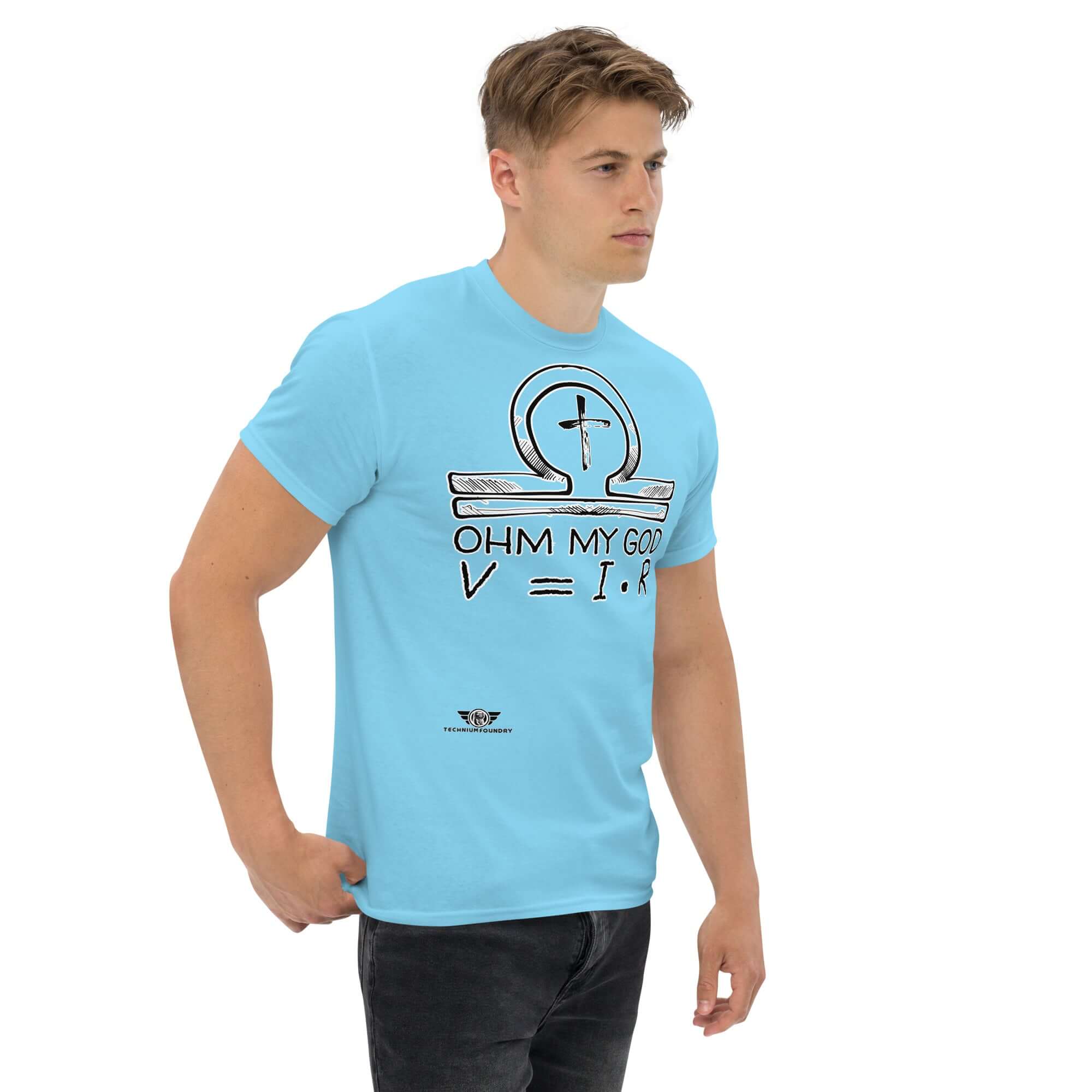 Man wearing Ohm My God T-Shirt with Ohm's Law religious humor, features an omega symbol and Christian ankh on a light blue background.