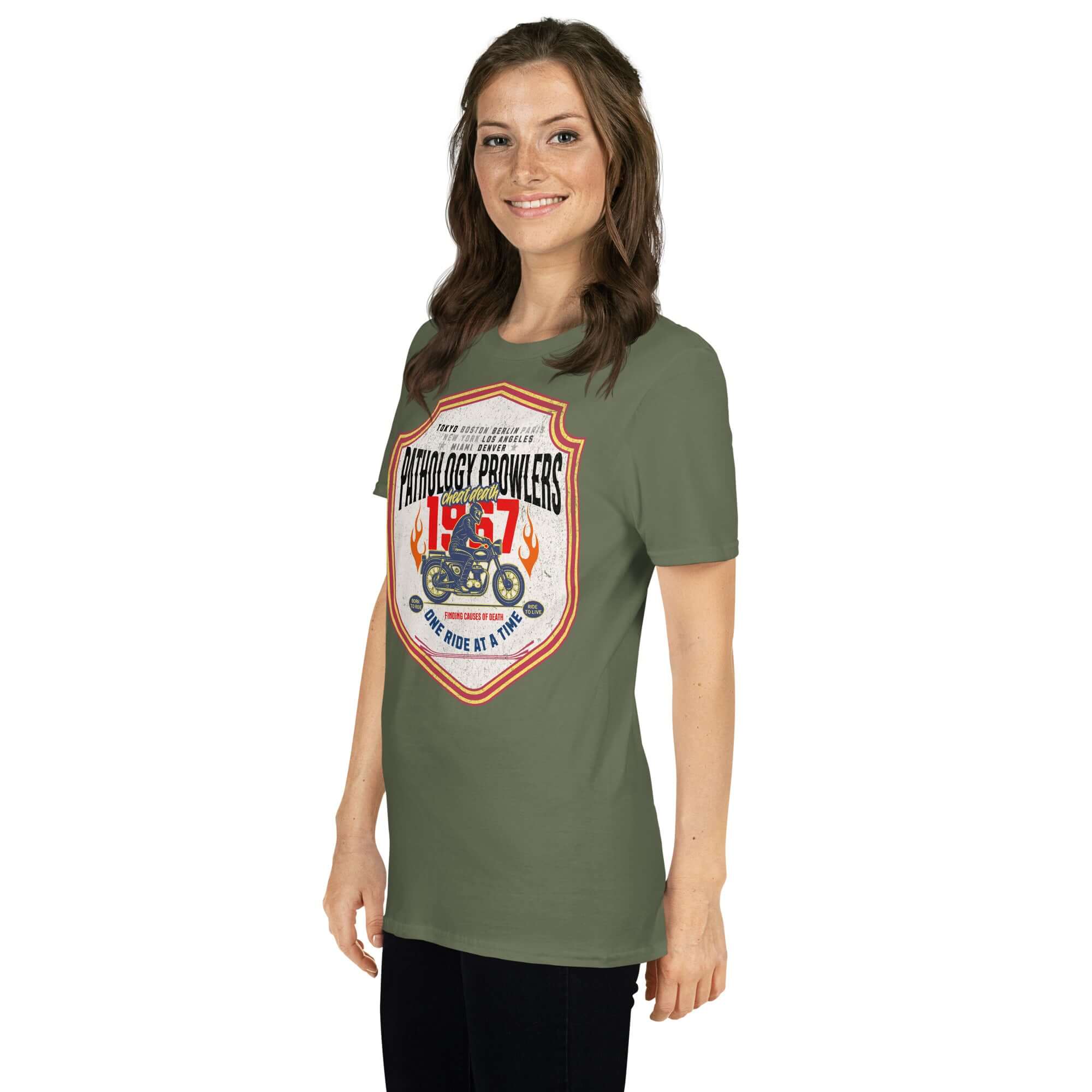 Model wearing Pathology Prowlers MC T-Shirt, Forensic Motorcycle Club Tee with vintage shield emblem, green color.