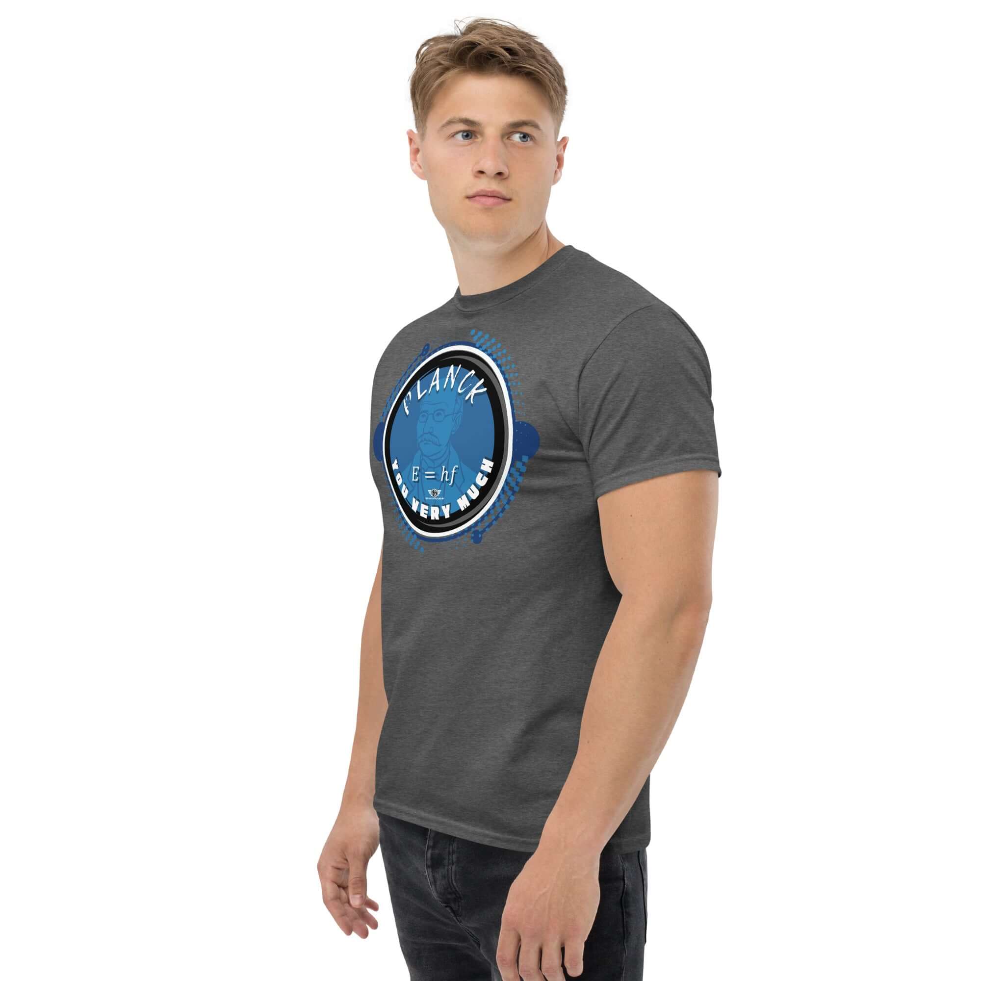 Model wearing "Planck You Very Much" t-shirt, featuring Max Planck's portrait and E=hf formula, in blue tones on a dark shirt.